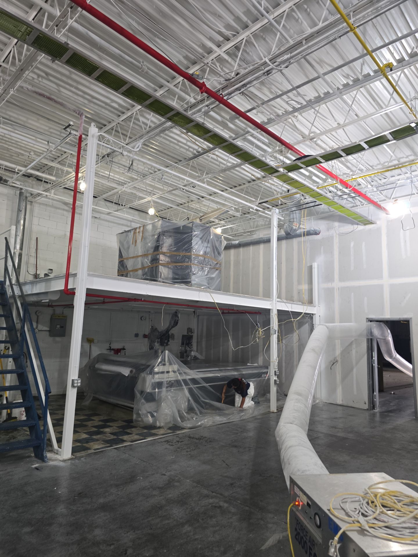 Industrial Warehouse Fire Damage Cleaning and Spray Sealing in Islandia by EMS Restoration Corp