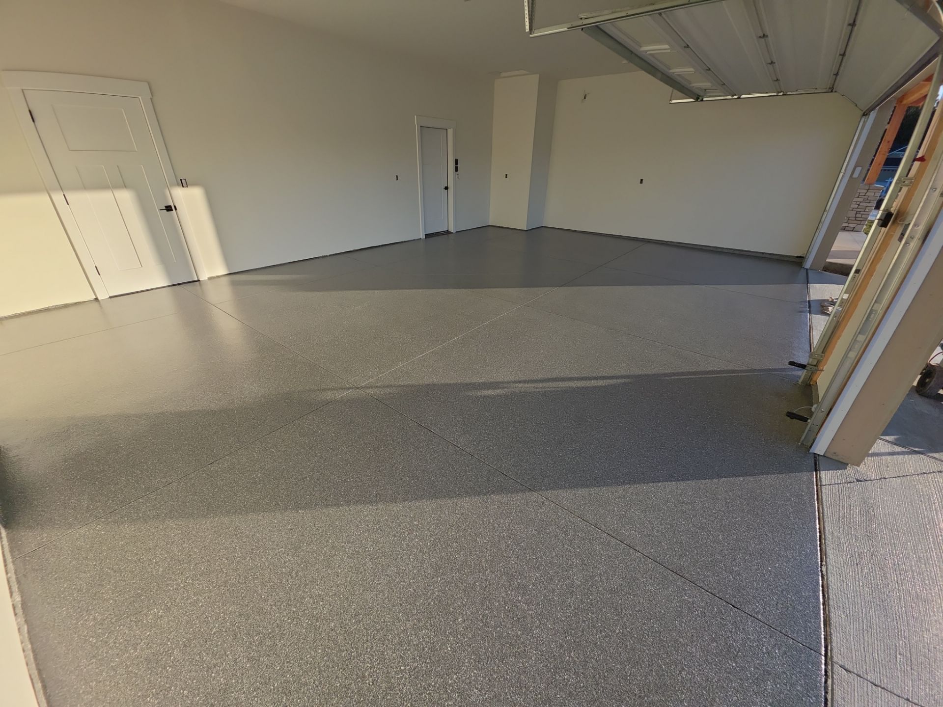 Garage Transformation using Turquoise Hybrid by Croc Coatings, LLC