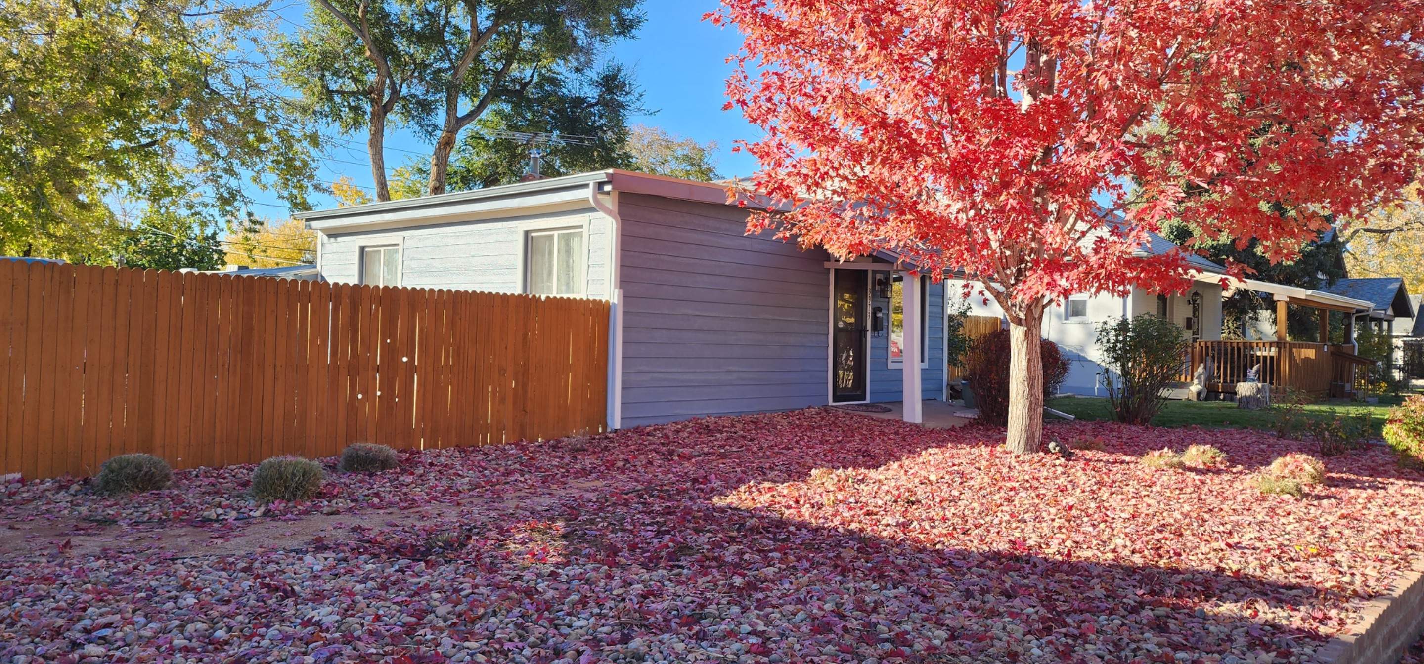 Beautiful little home in Denver receiving Lp Smartside Siding by 1st choice windows and siding