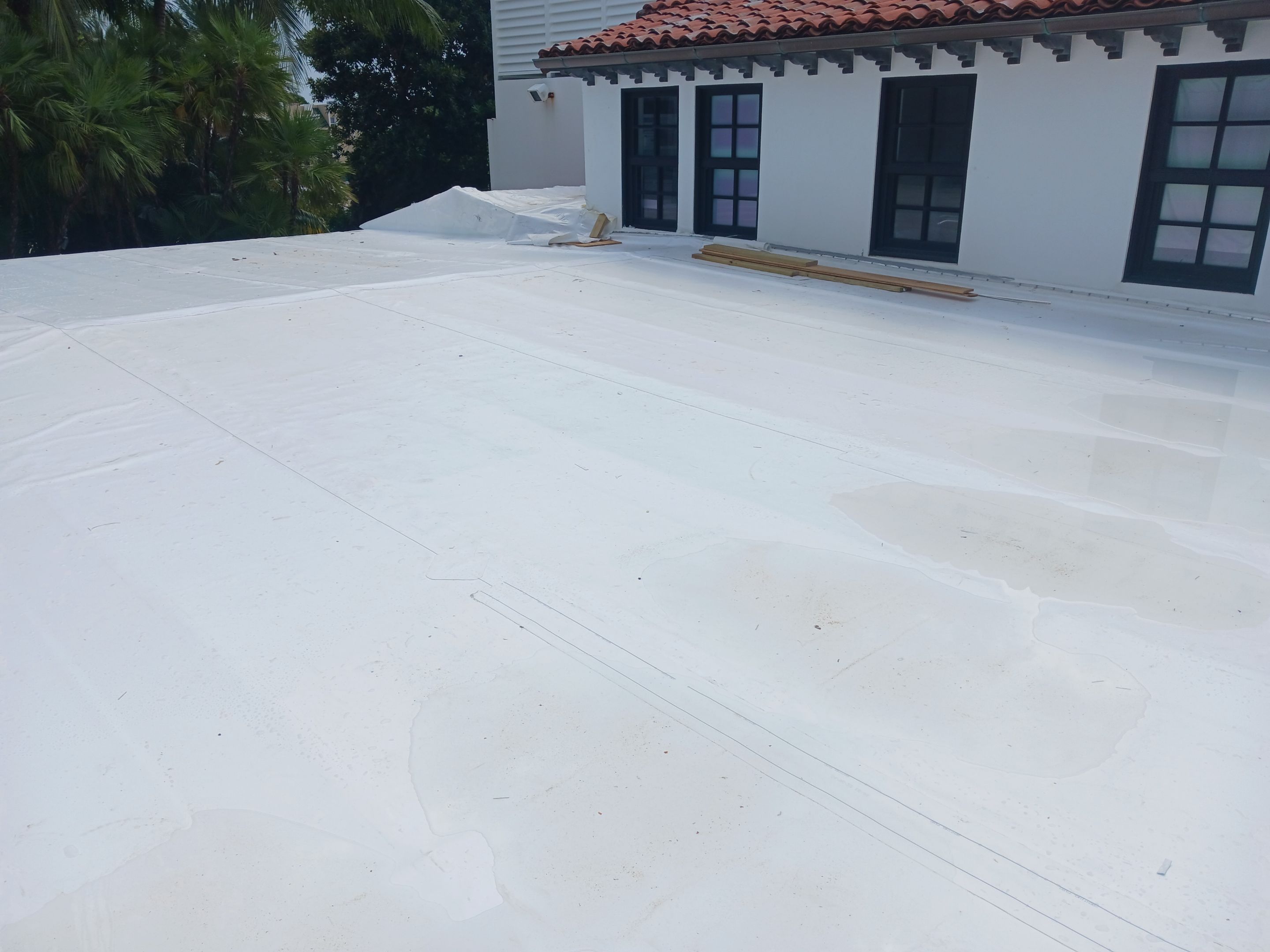 Commercial Roof Membrane Installation and Clay Tile Repair in Surfside by AJF ROOFING INC