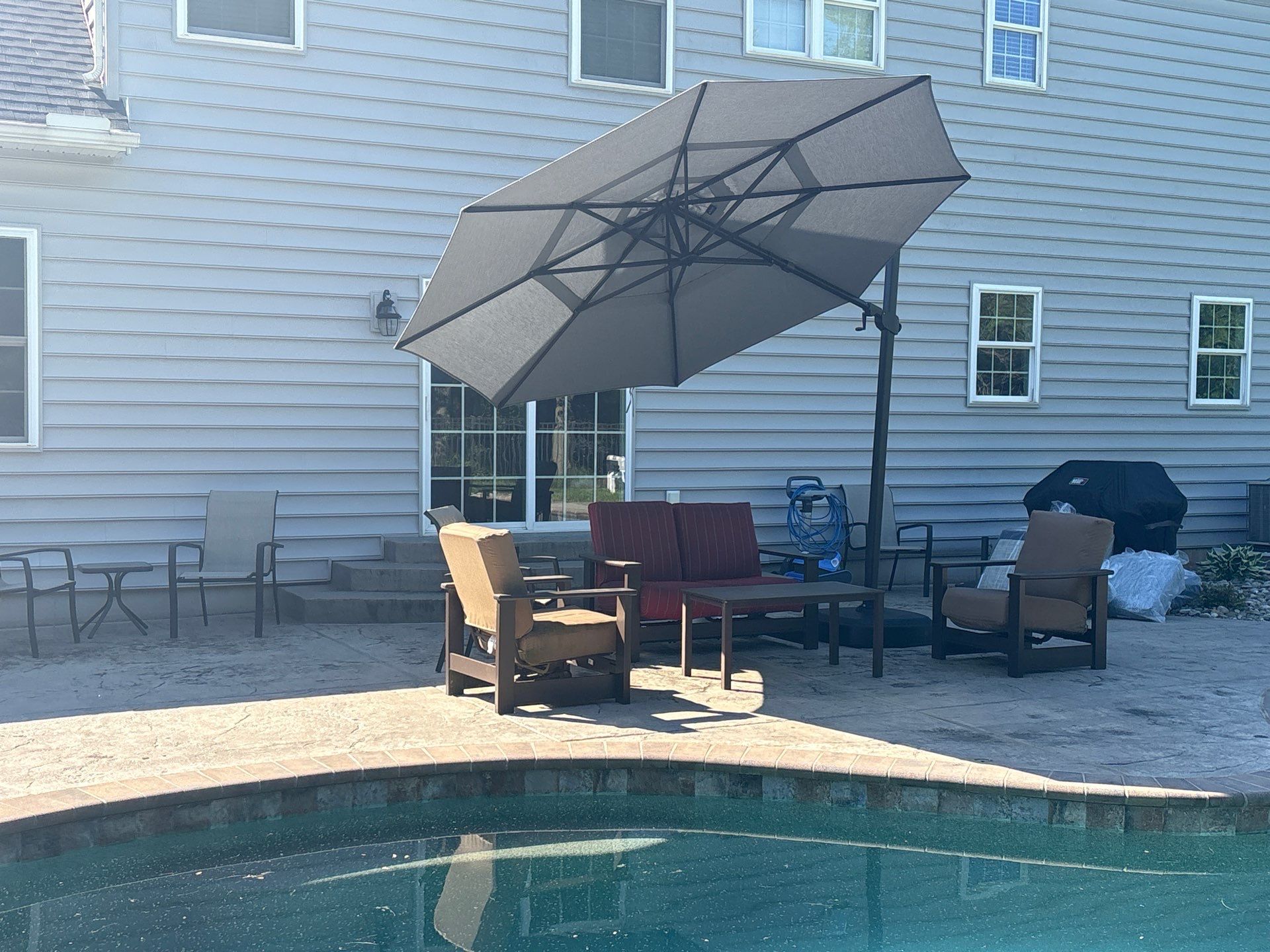 Cantilever Umbrella & Telescope Seating Set by Bowman's Stove & Patio