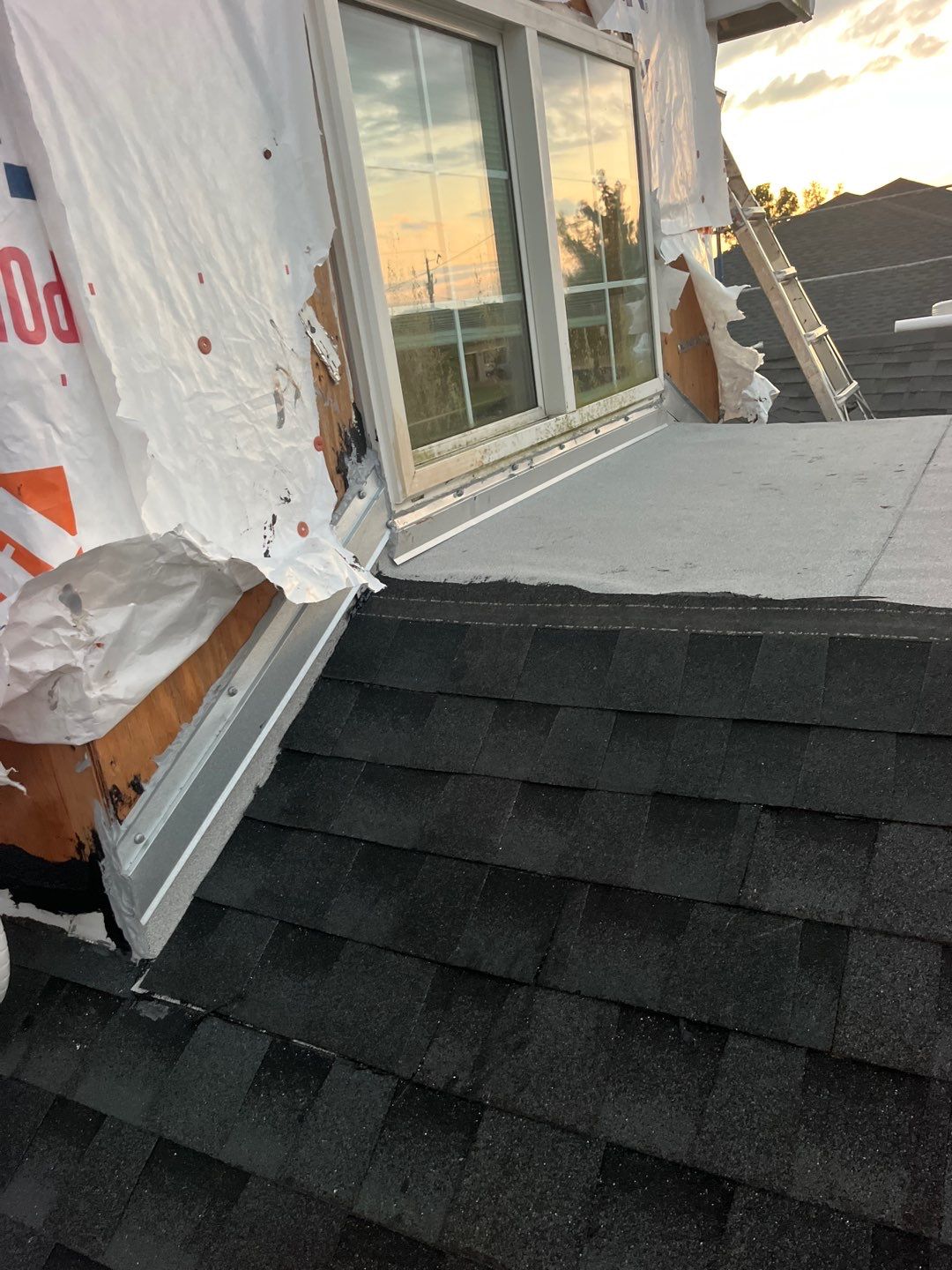 Shingle roof repair by Durabilis Roofing INC