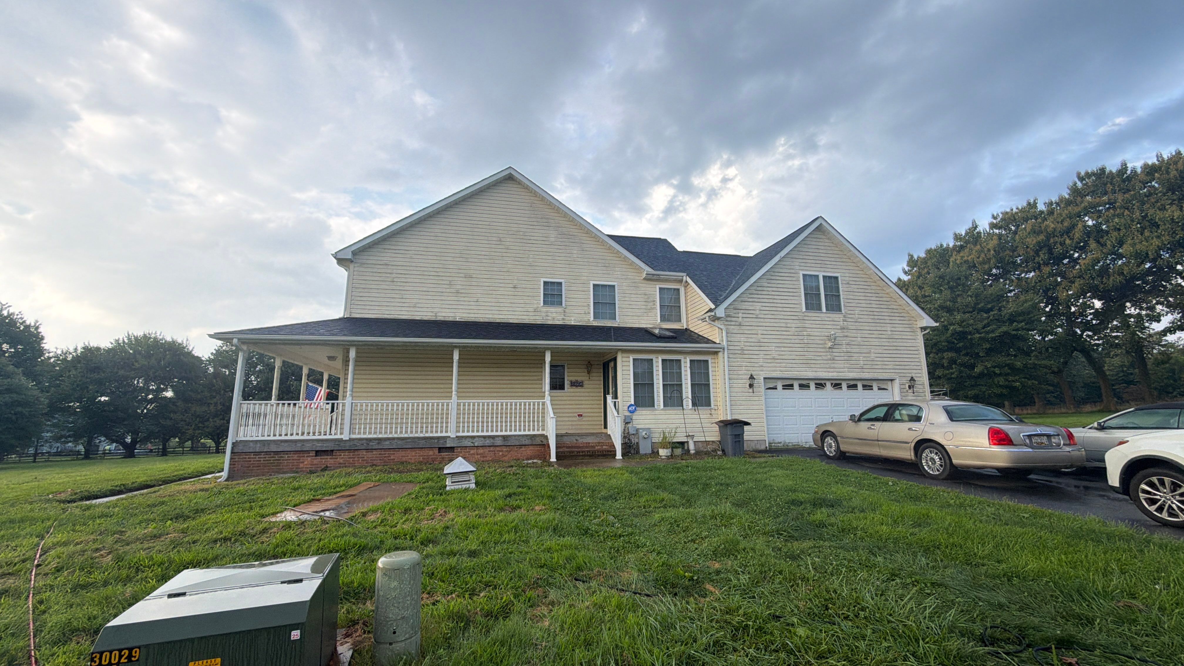Vinyl Siding House Washing and Wood Deck Restoration in Carroll County by Baltimore Pressure Washers Inc.