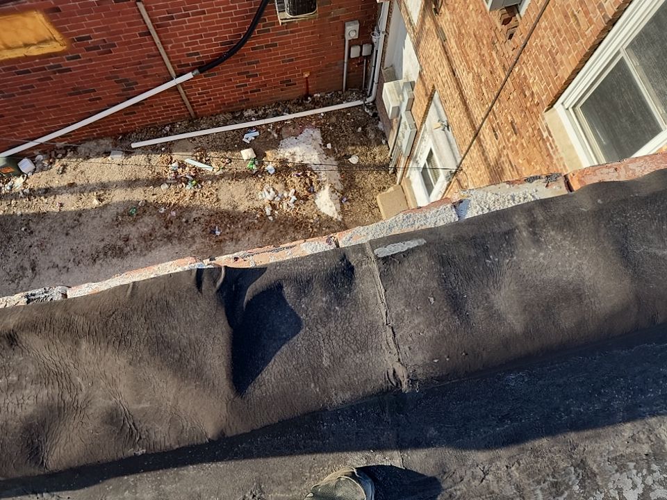 Recover of a downtown building  by Grell Roofing, LLC