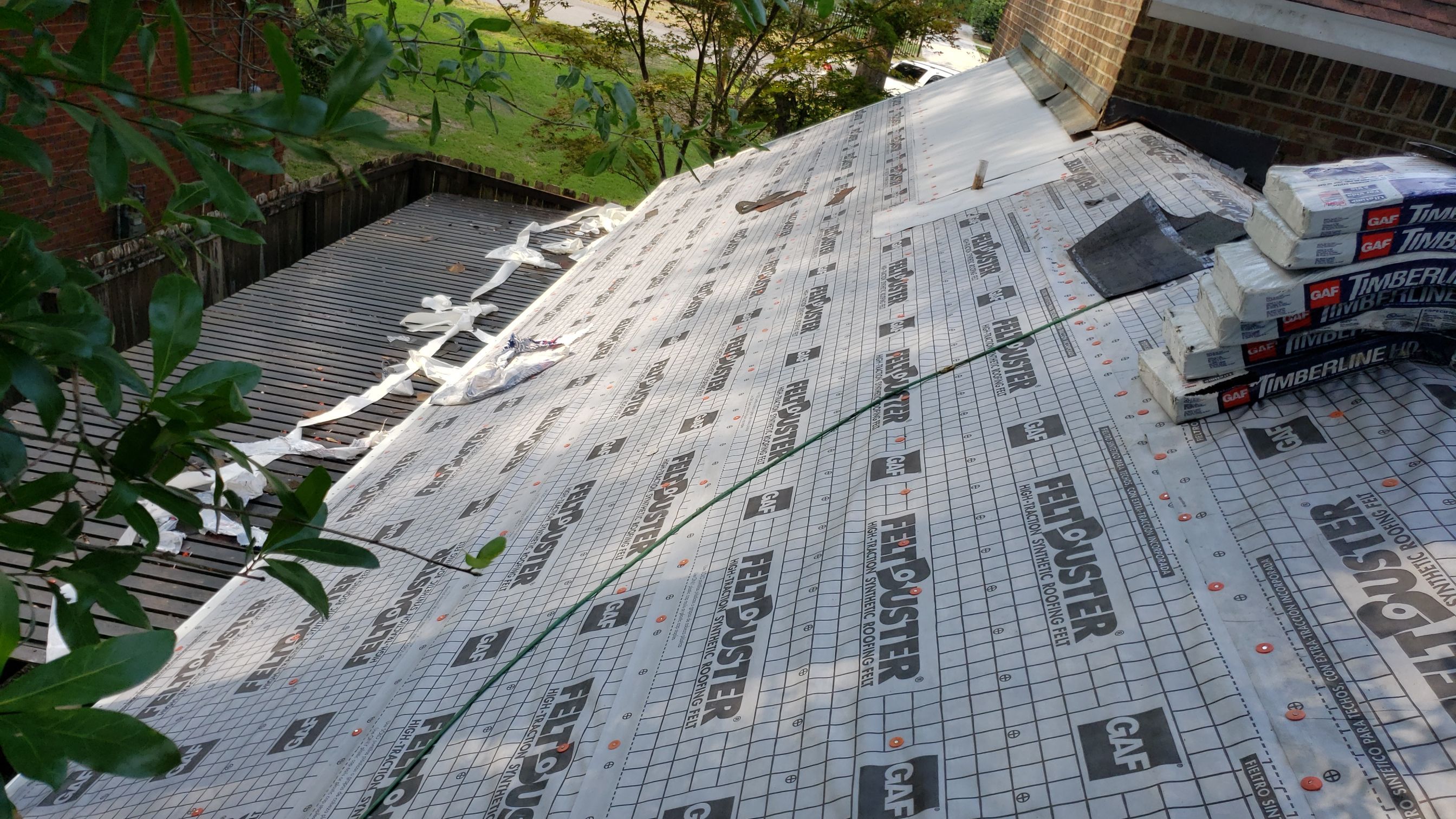 Residential Roofing Installation using Roof Replacement by American Roofing & Construction LLC
