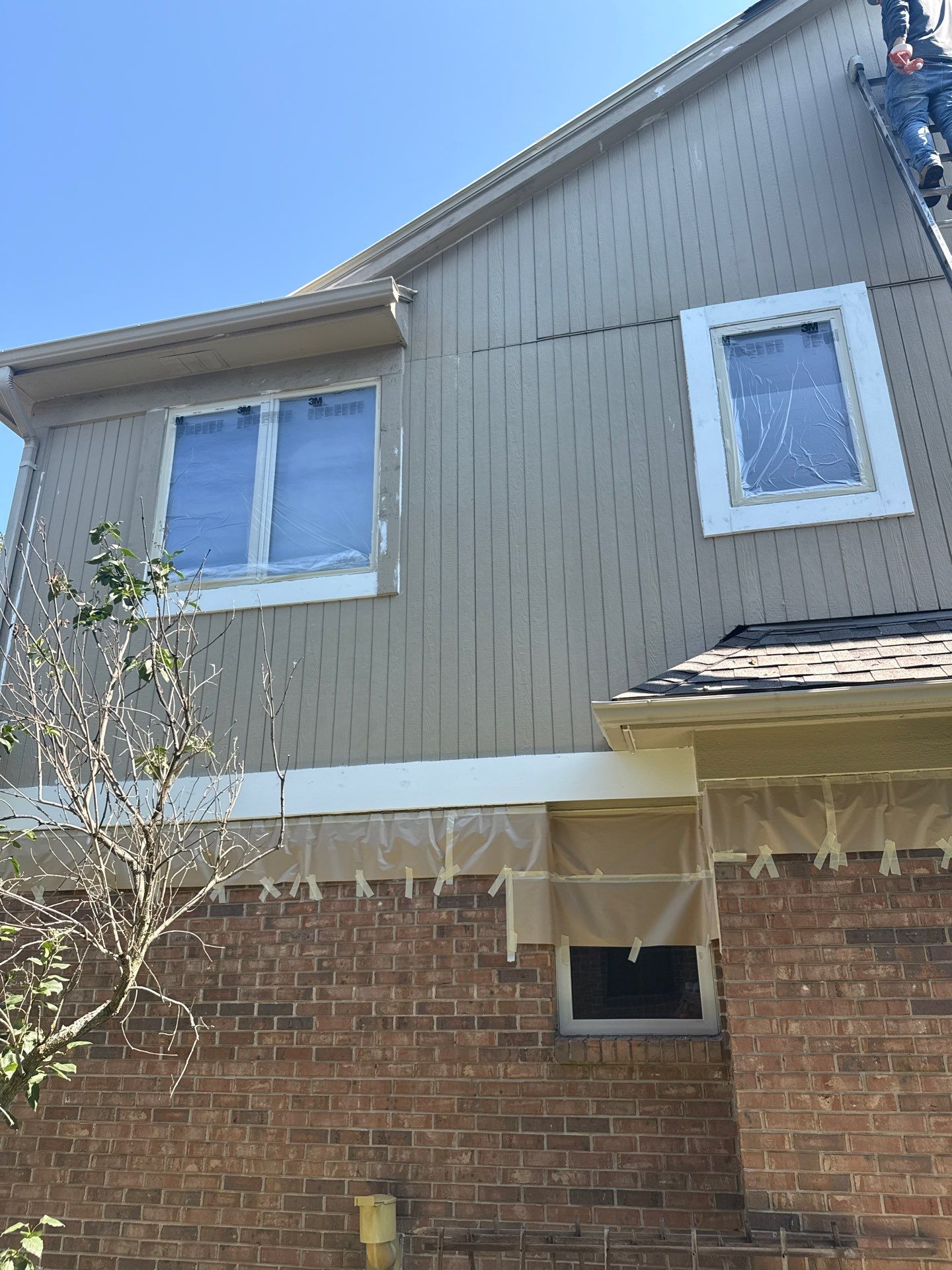 Siding and Wood Trim Repair for Washington Residential Property by Top Shelf Painter
