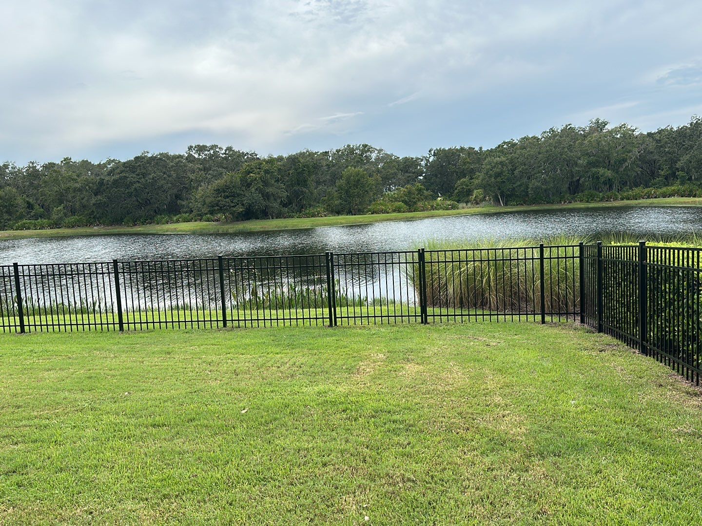 Aluminum Fence Installation using Black 3 Rail Aluminum Fence by Asap fence and gates, LLC