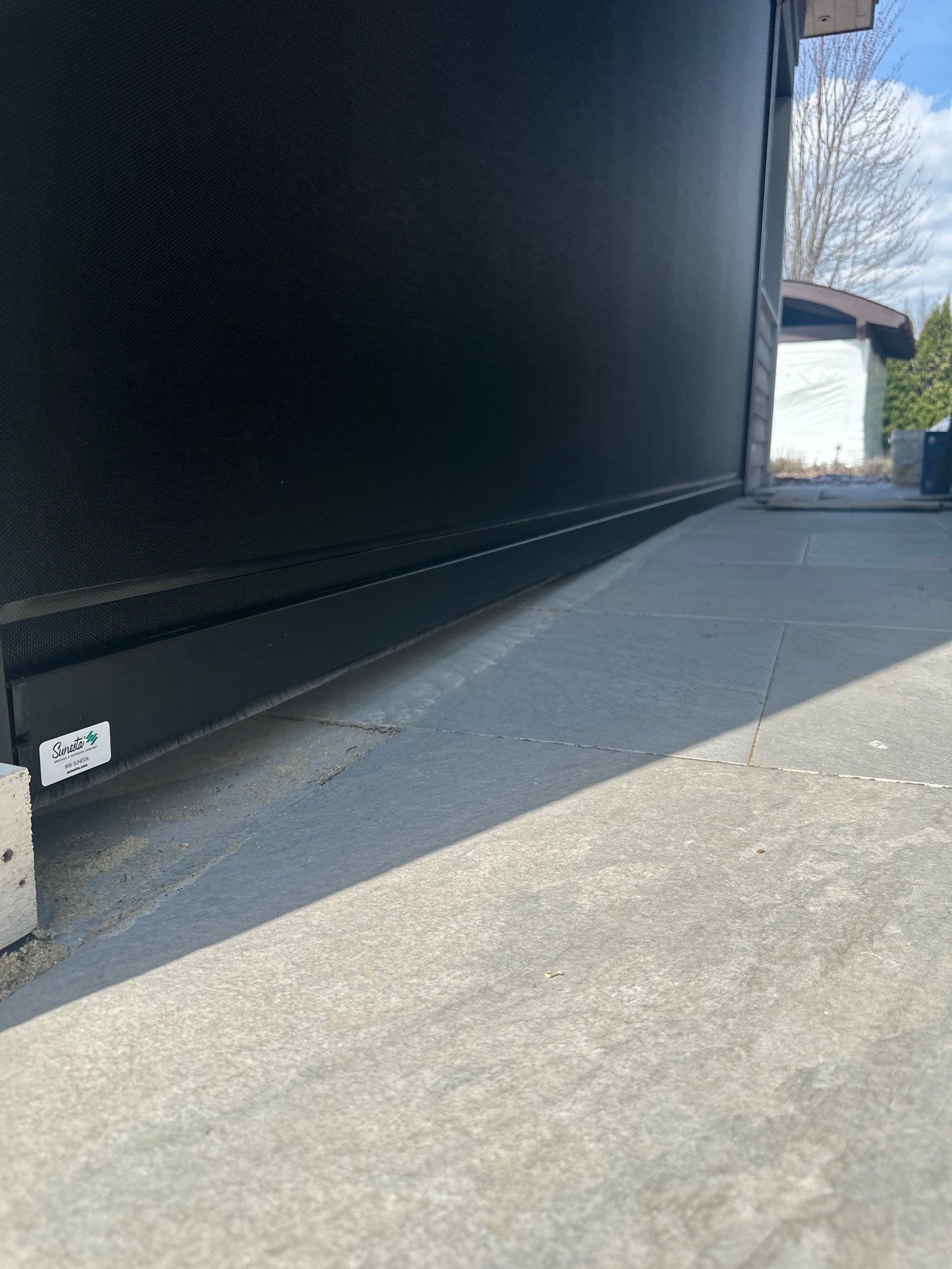 Sunesta Retractable Screen and Gutter Protection in Petoskey by Rainbow Seamless Systems