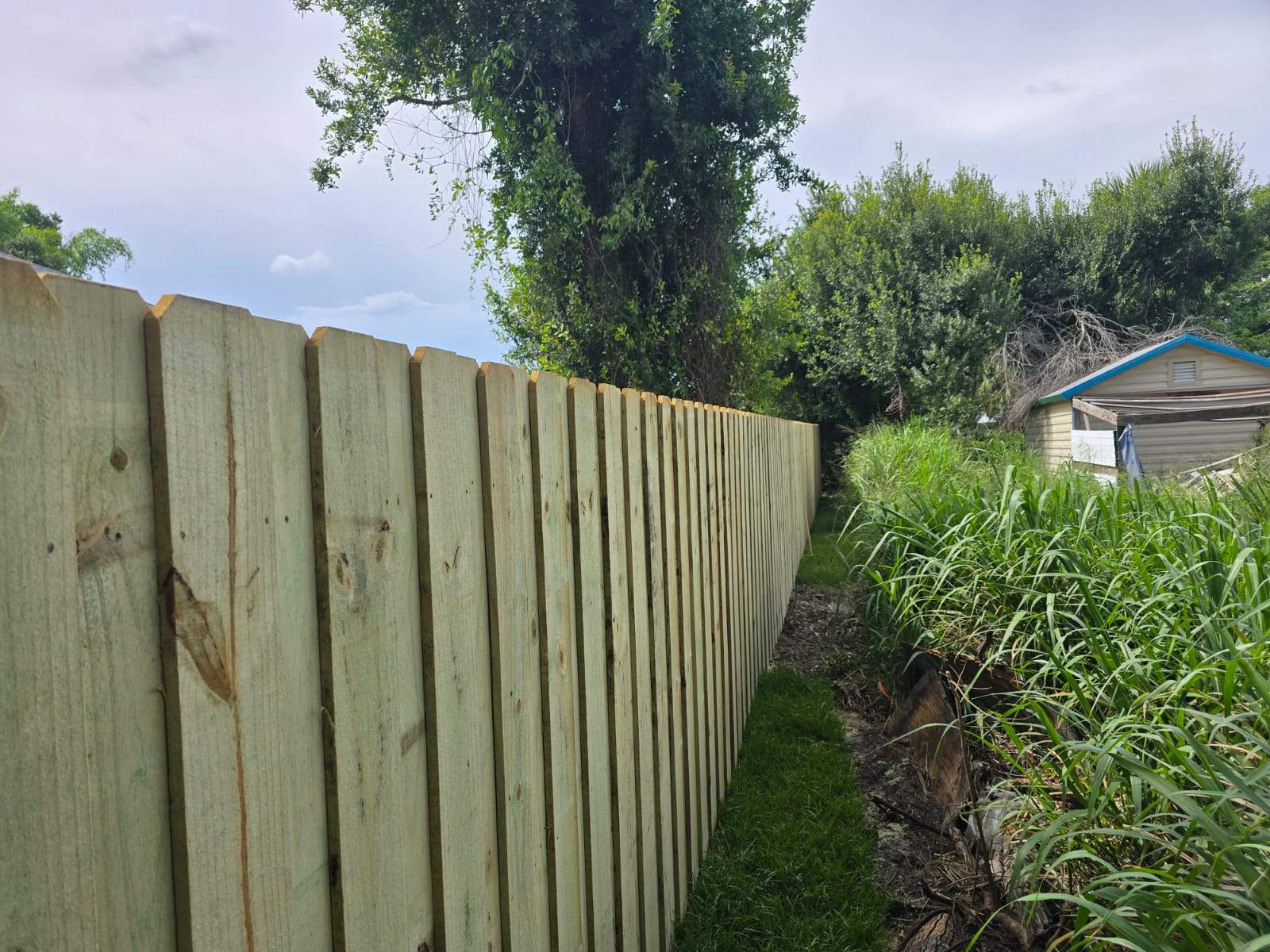 Custom Wood Privacy Fence and Gate Installation in Punta Gorda by True Fence LLC
