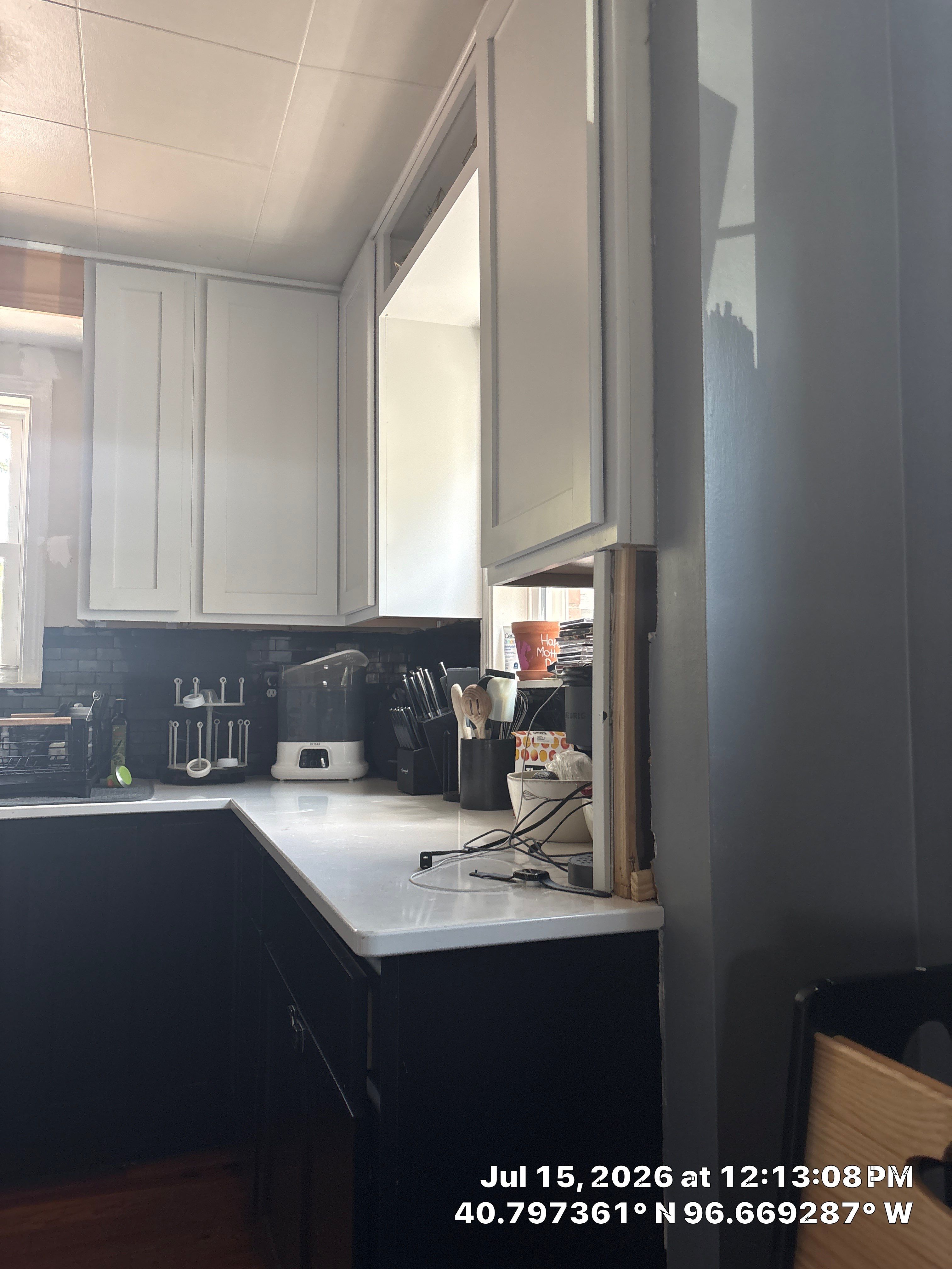 Modern Lincoln Kitchen Renovation Featuring Matte Black and White Cabinetry by CompanyCam Sales Demo