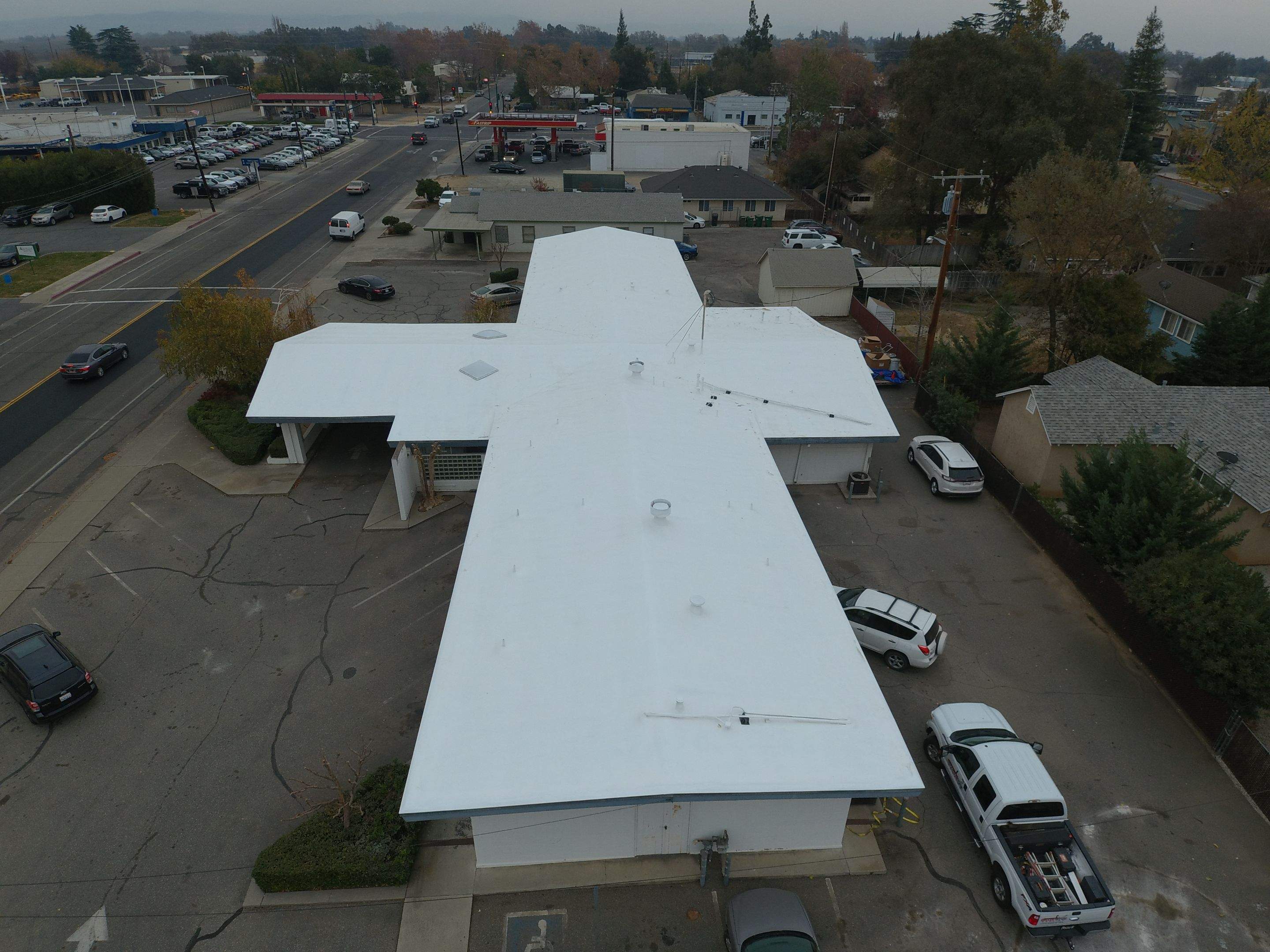 Spray foam and coatings using Conklin Benchmark/PUMA XL coatings and spray foam by Straight Edge Roofing Inc