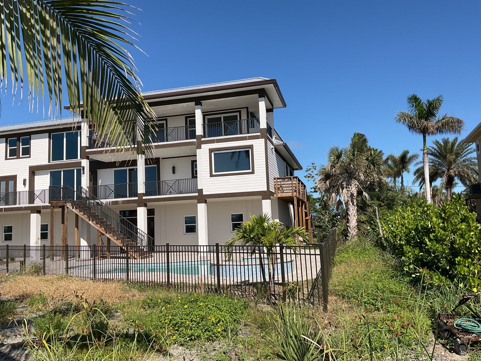 Brown Gutter Installation in Sanibel FL by Gutter Professors