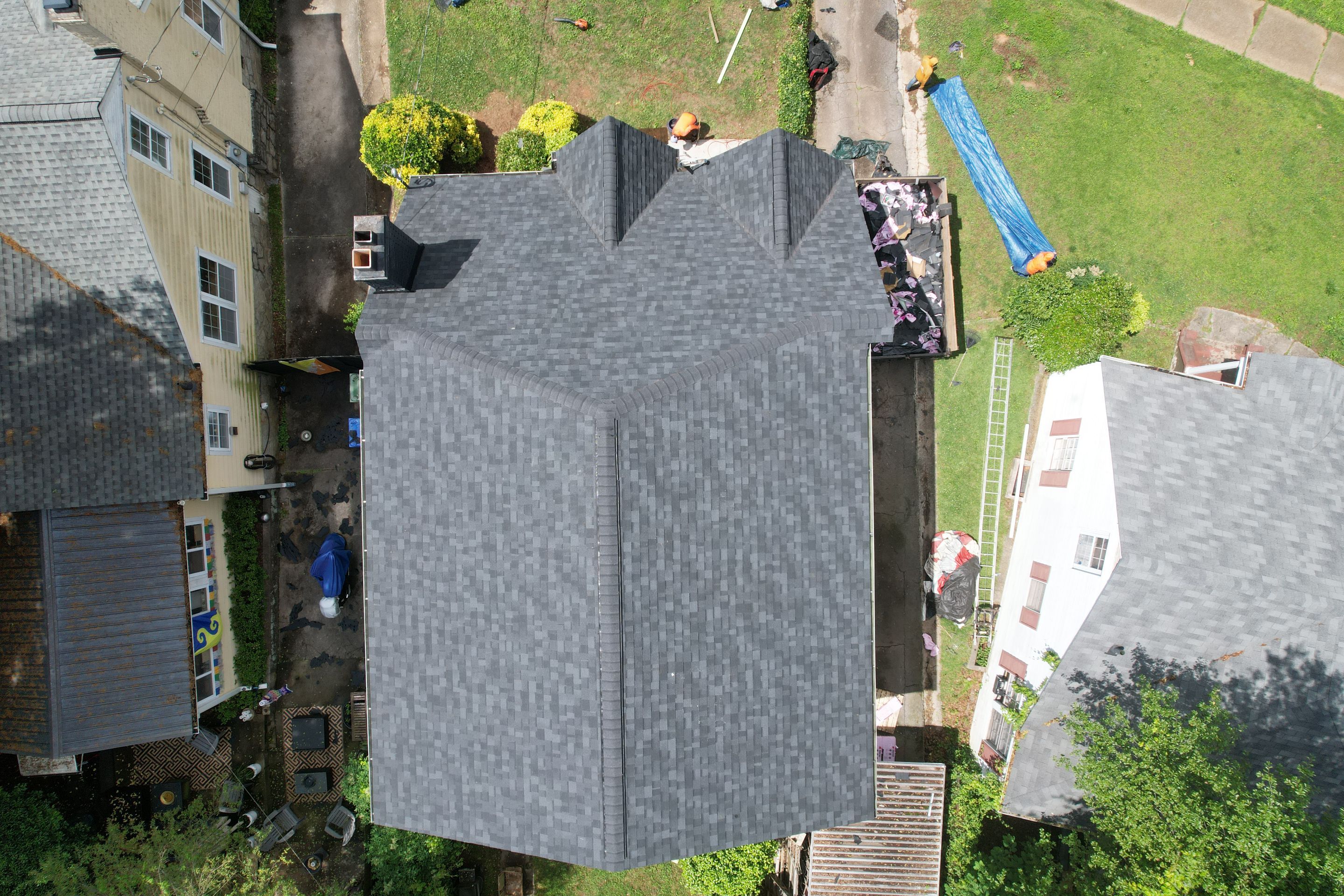 Residential Roof Replacement using Owens Corning Trudef Twilight Black by Inspector Roofing and Restoration