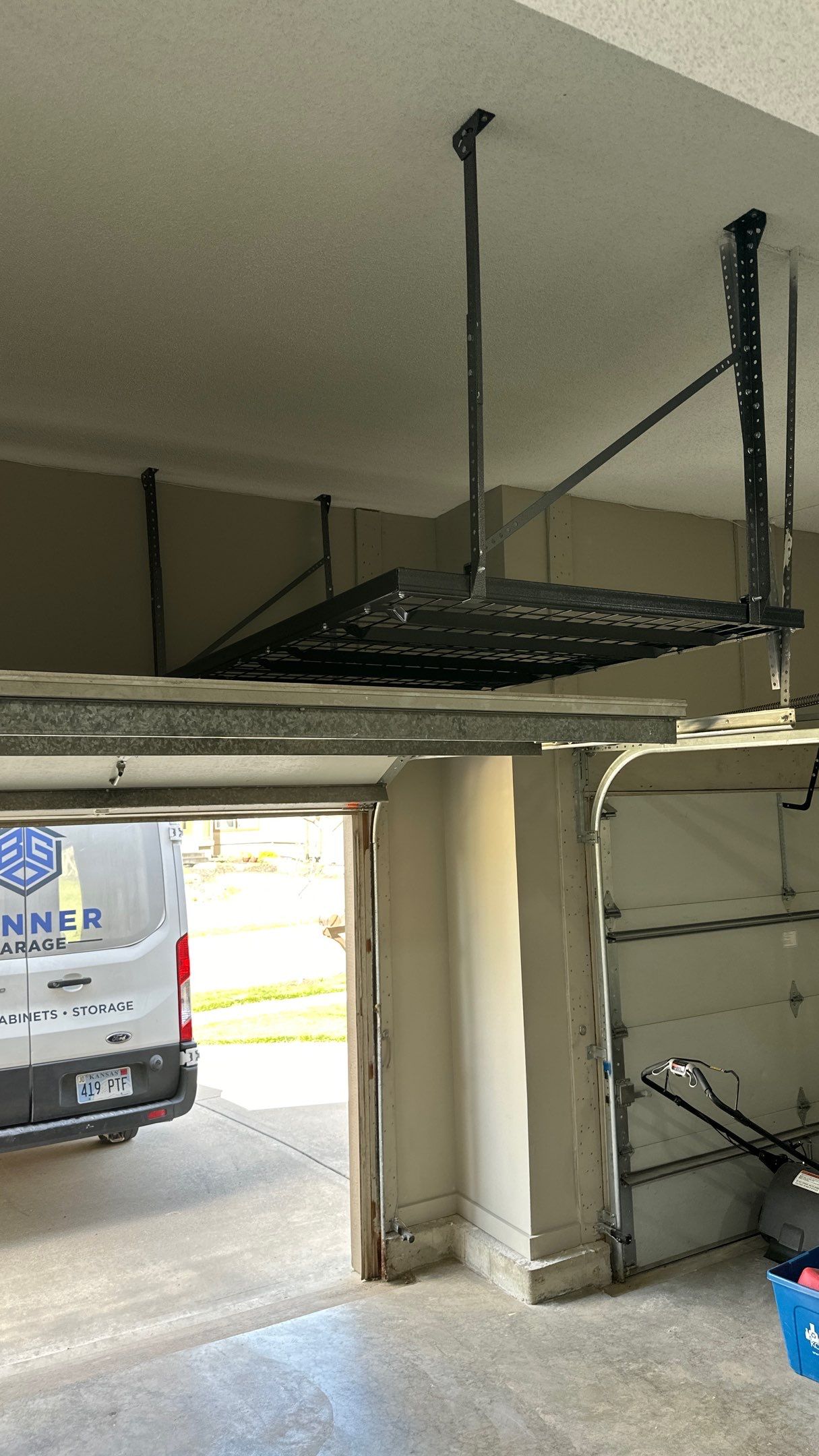 Mark S. chose Global Pine slotwall with his Pewter cabinets.  by Banner Garage