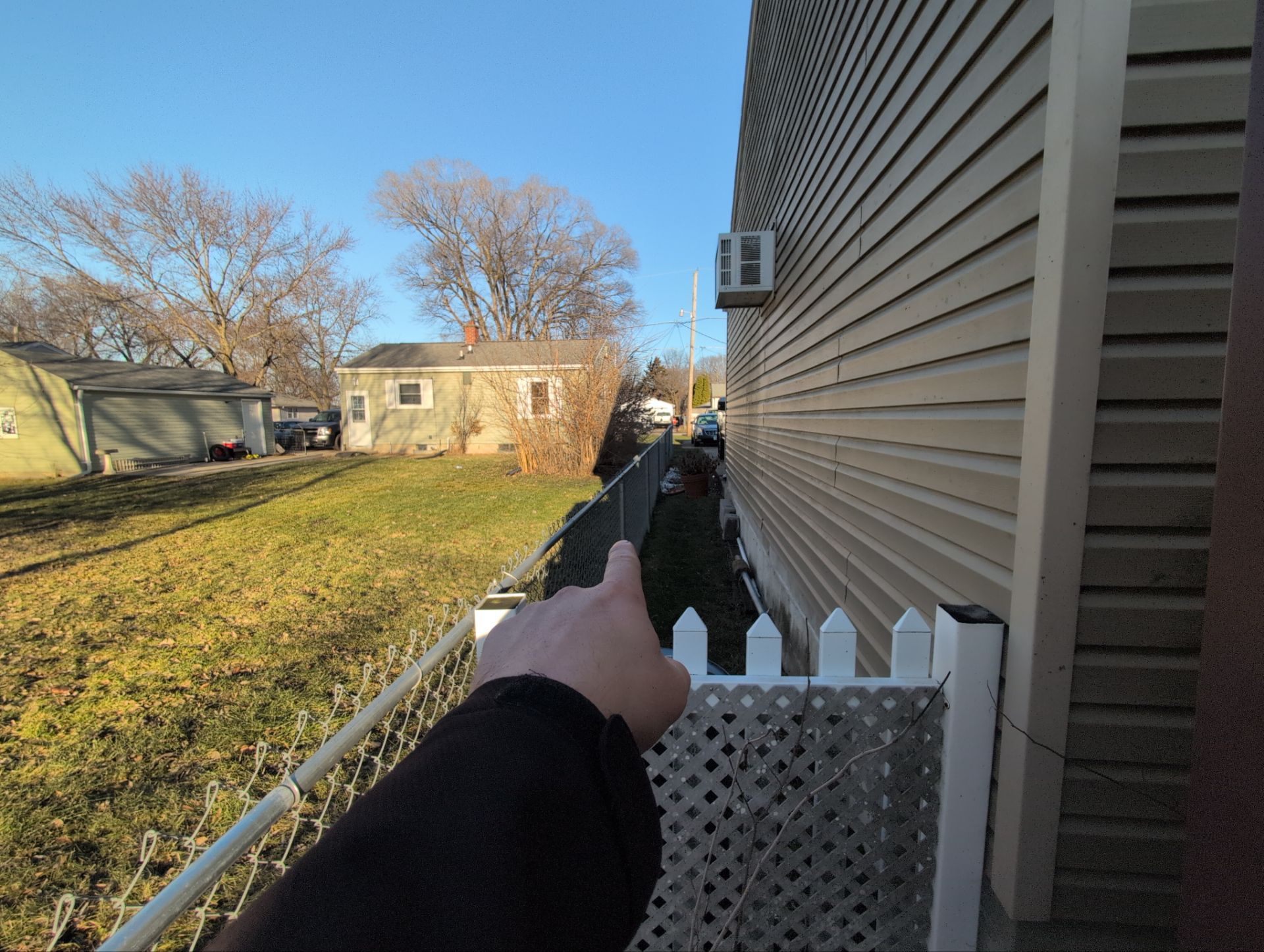 Galvanized Chain Link Fence and Vinyl Gate Installation in Washburn by Perfect Picket Fence and Stain