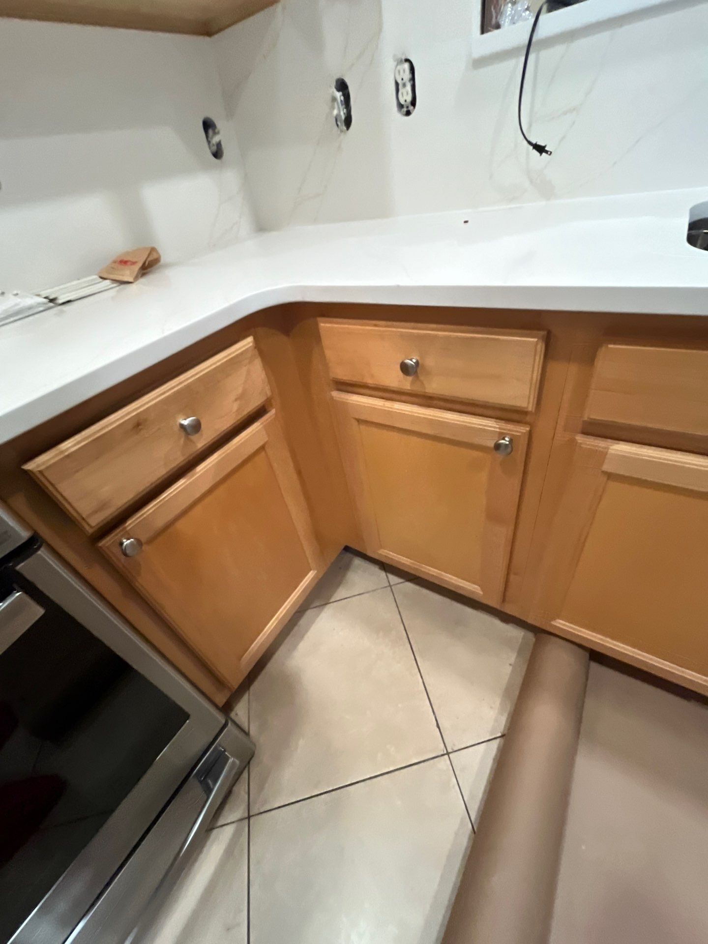 Cabinet Painting - wood to white by Five Star Painting