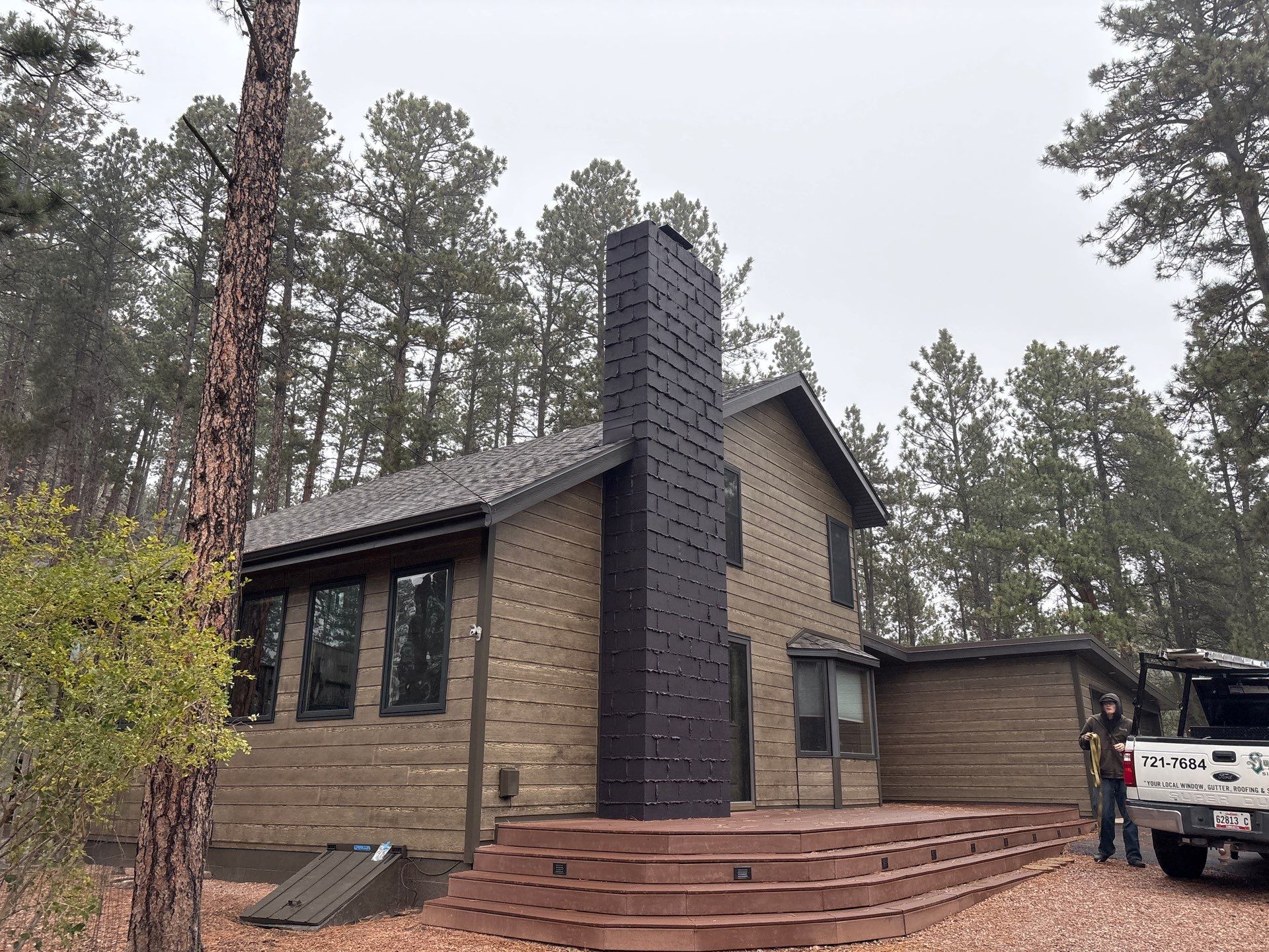 Home in the Black Hills Transformation by Superior Siding Inc