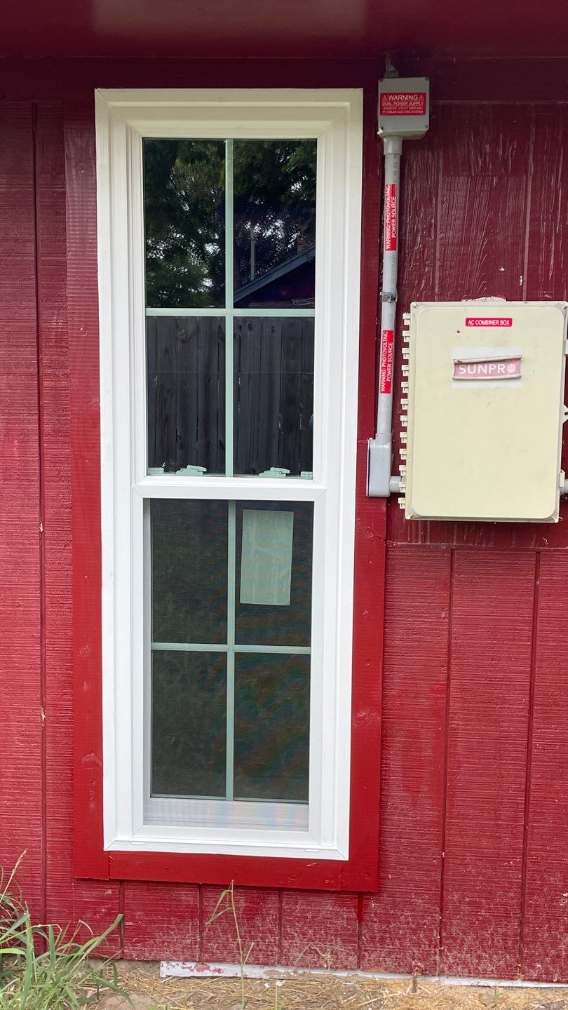 Black and white and red all over by Bayfront Roofing and Construction
