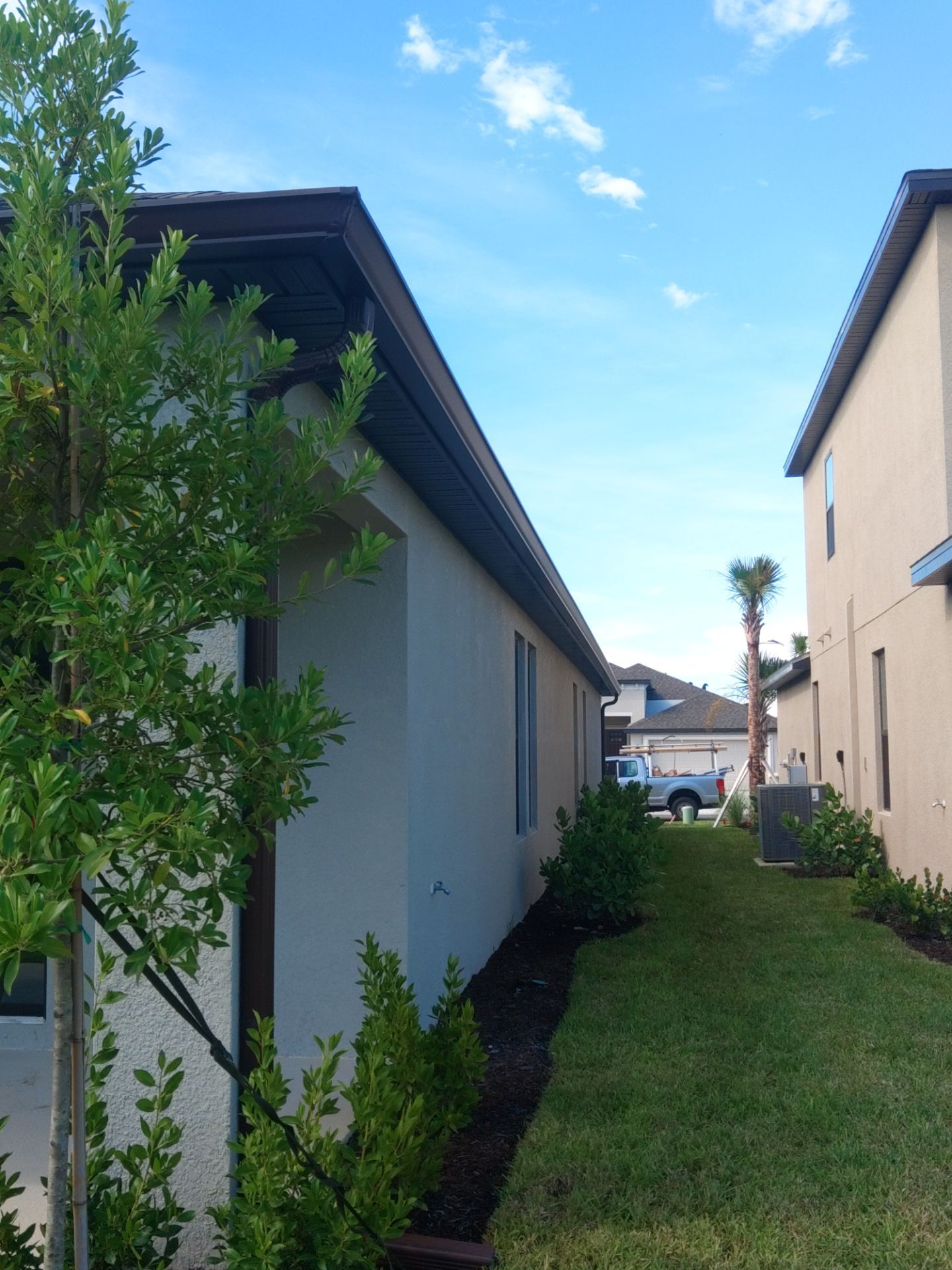 Musket Brown Seamless Gutters using Musket Brown Seamless Gutters in Nokomis FL by Gutter Professors