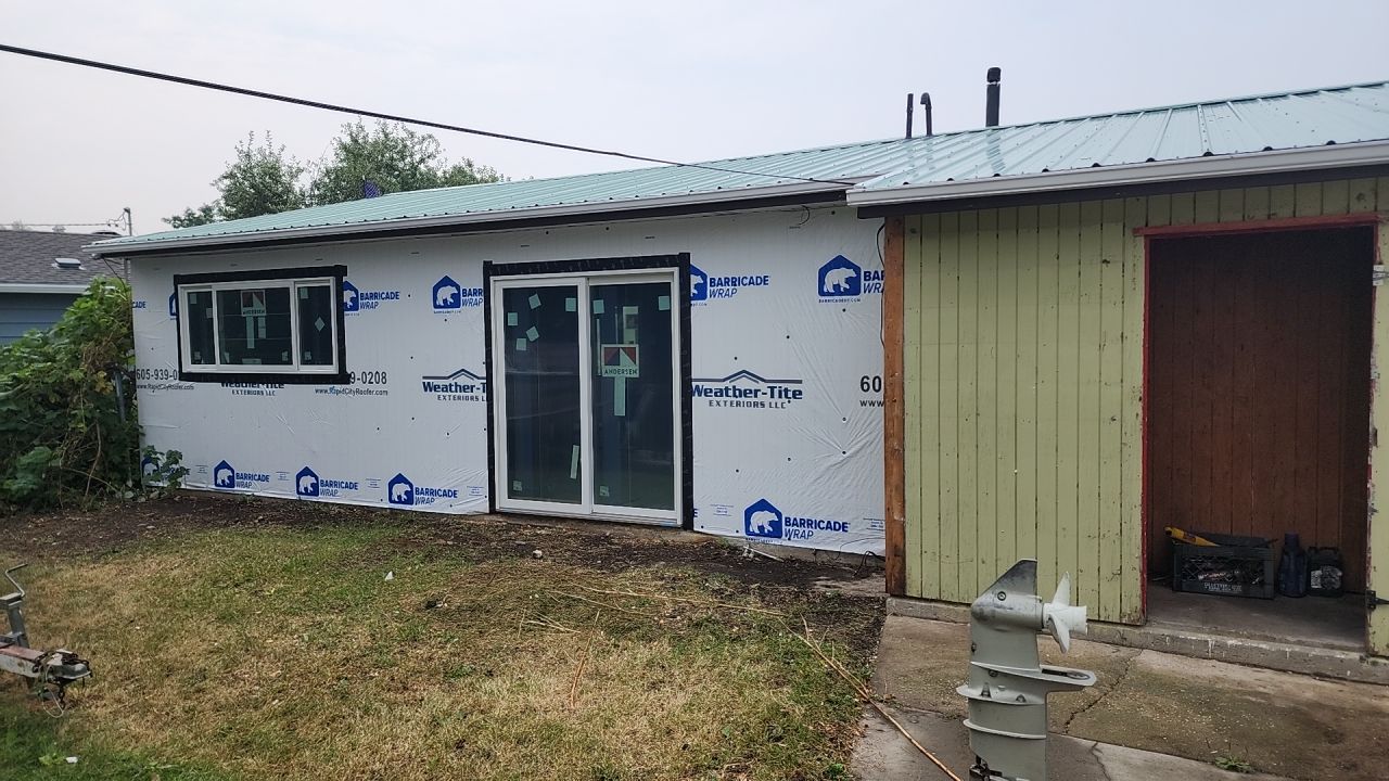 A little bit goes a long way. by Weather-Tite Exteriors LLC