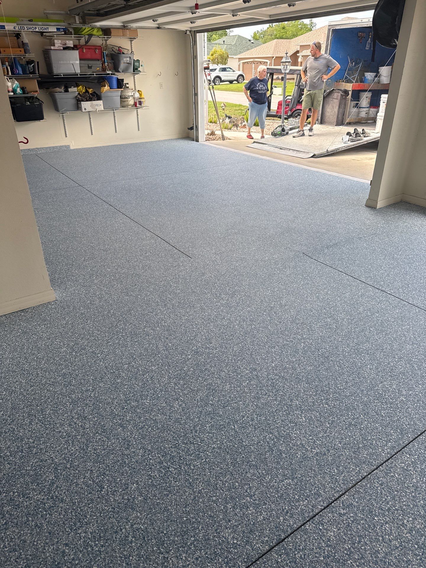 Garage, Drivewat, and Sidewalk in Landshark and Tidalwave by Innovative Concrete Coatings 