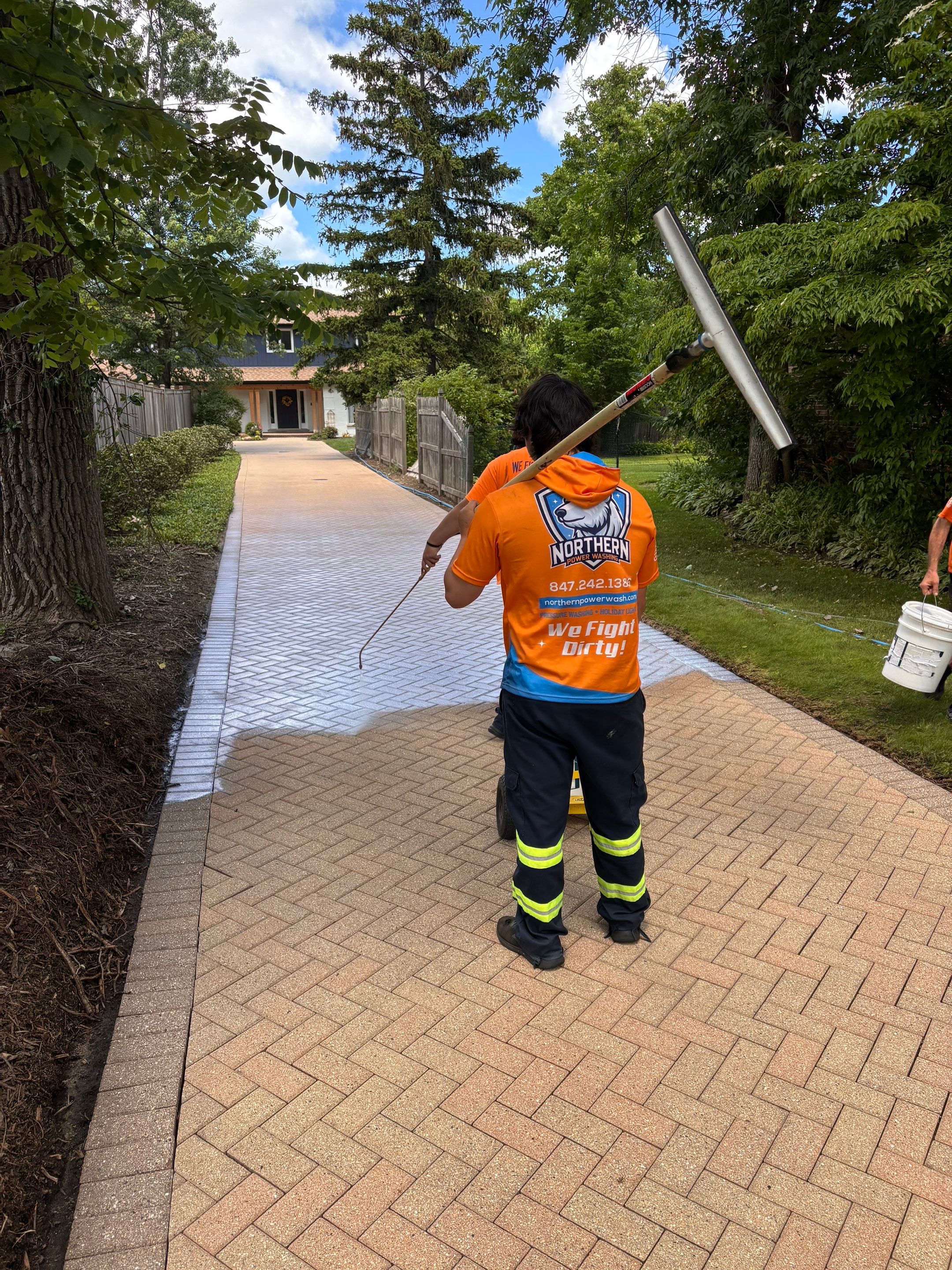 Brick paver repair, cleaning and sealing by Northern Power Washing LLC.