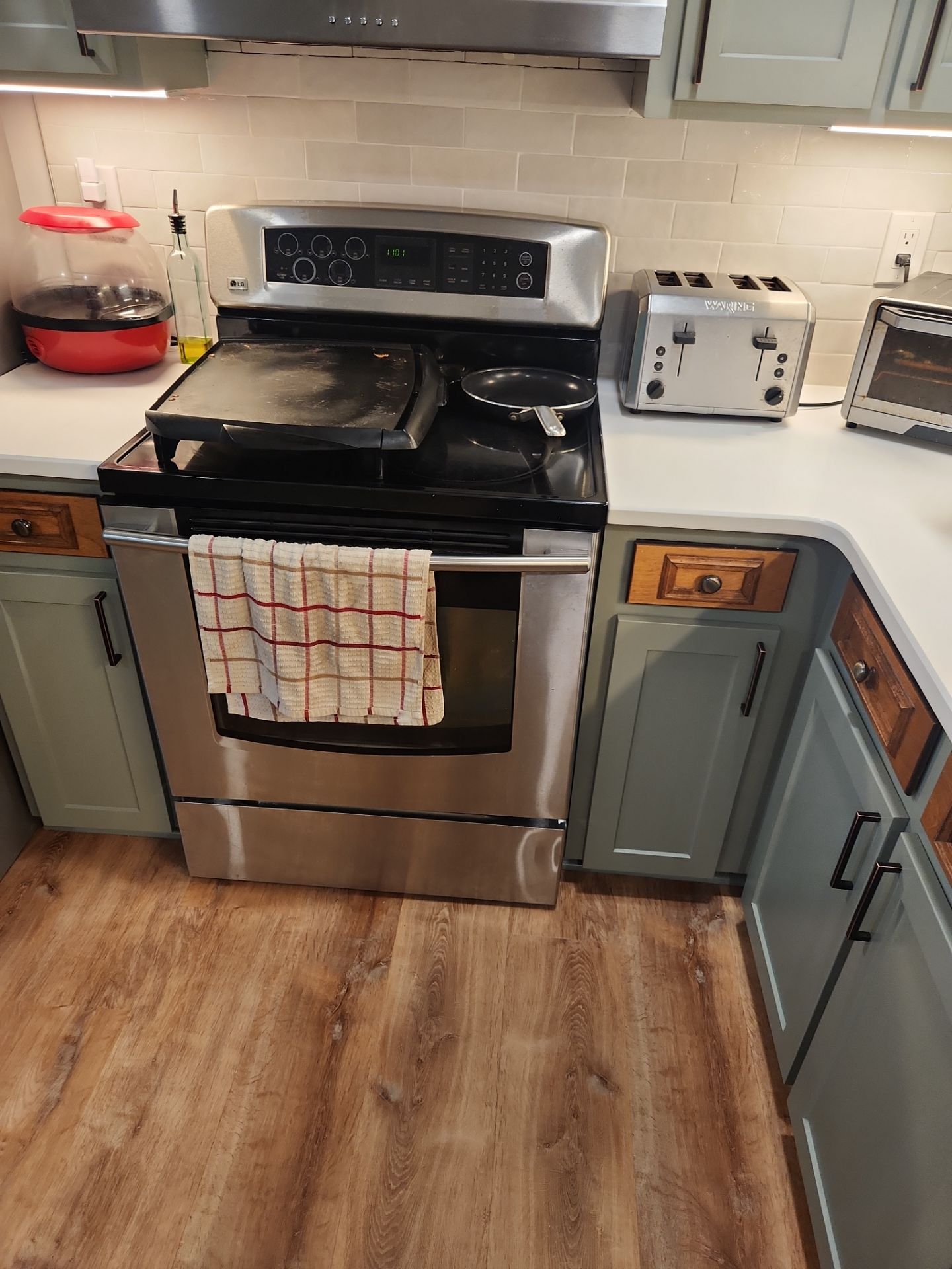 A Pathway to Personality – A Two-Tone Kitchen Transformation in Apex by Elite Remodeling and Design LLC
