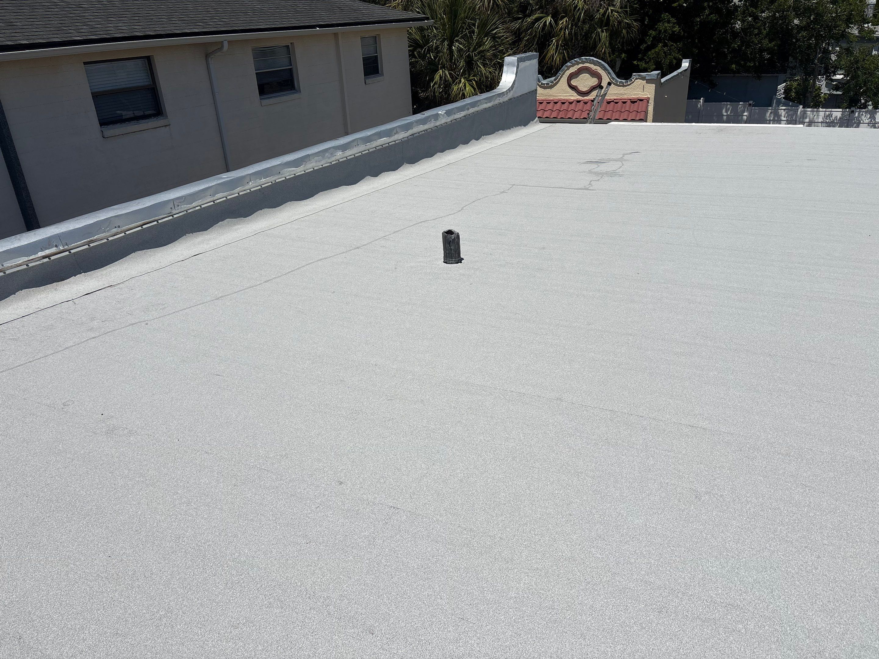 Flat Reroof Replacement Daytona Beach FL by Pinnacle Roofing Group