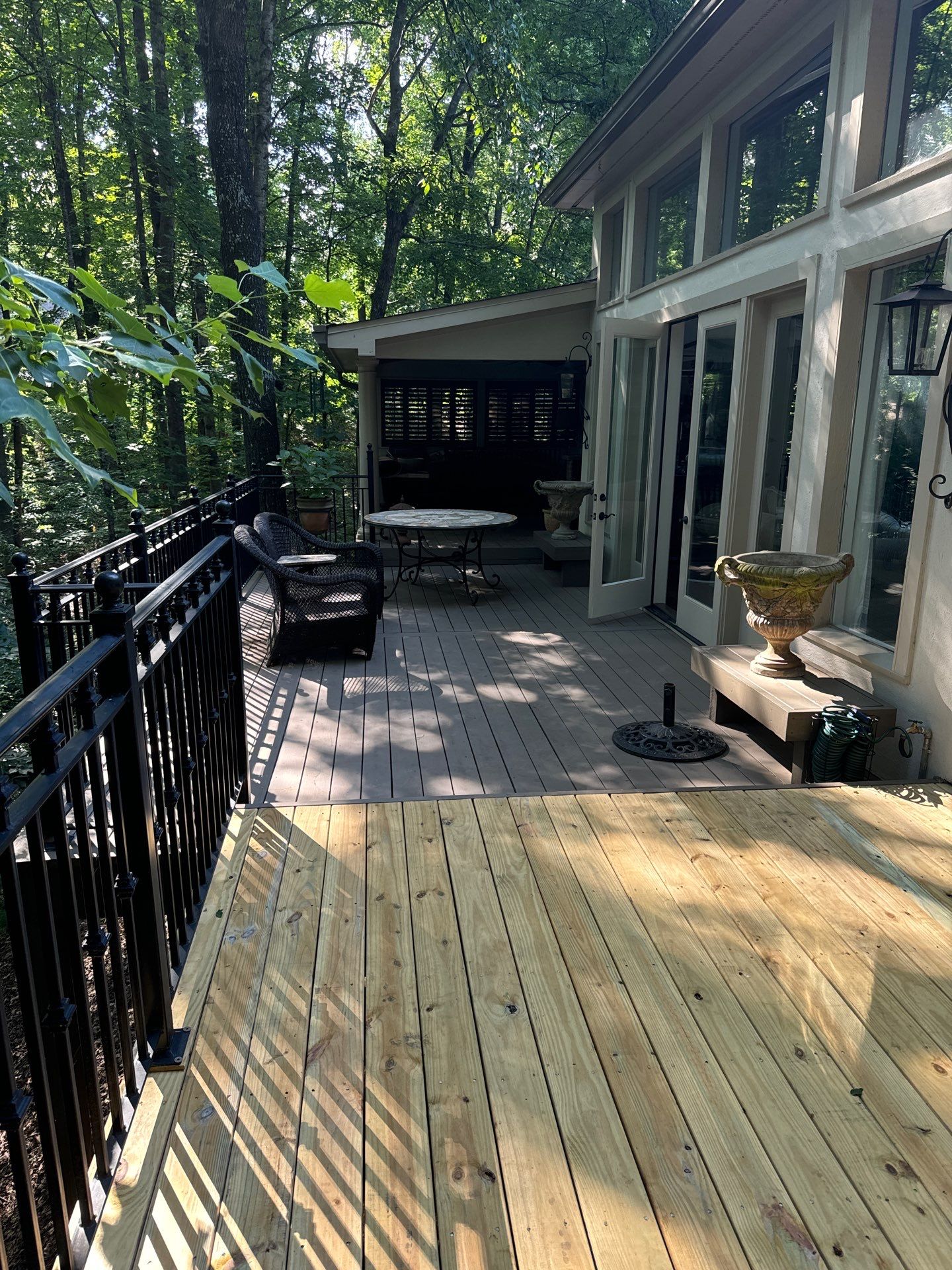 Custom Tiered Composite Deck and Covered Porch in Alpharetta by Swift Home Renovations