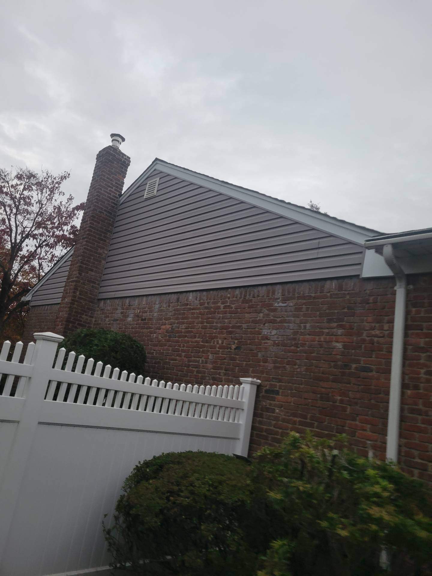 New Siding & Trim by Island Roofing Inc.