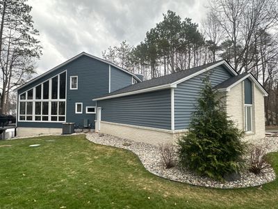 Siding Replacement using CertainTeed Board & Batten Pacific Blue