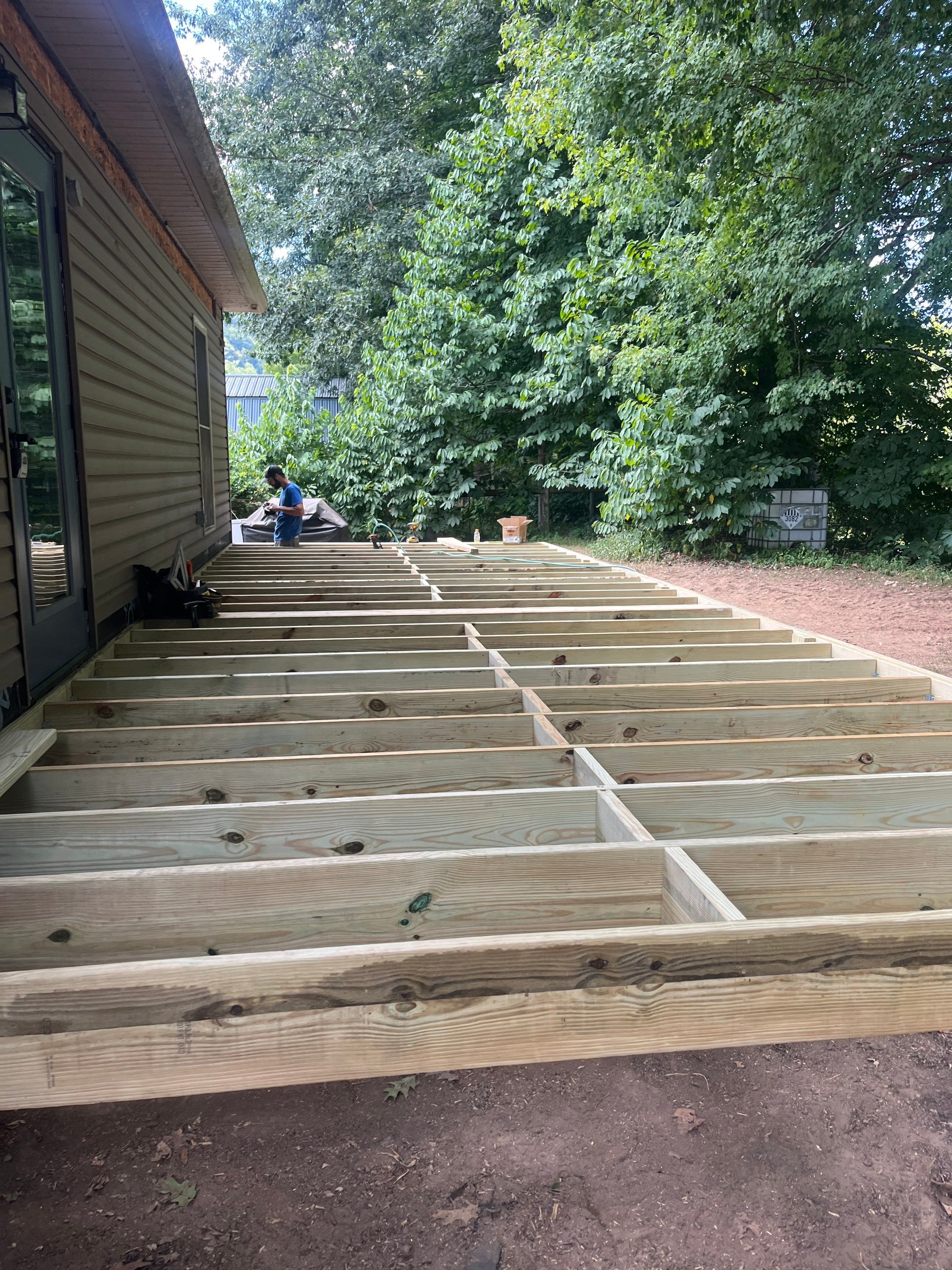 Custom Composite Deck and Screened Porch Addition in Hinton by Walnut Hollow Decks & Outdoor Living