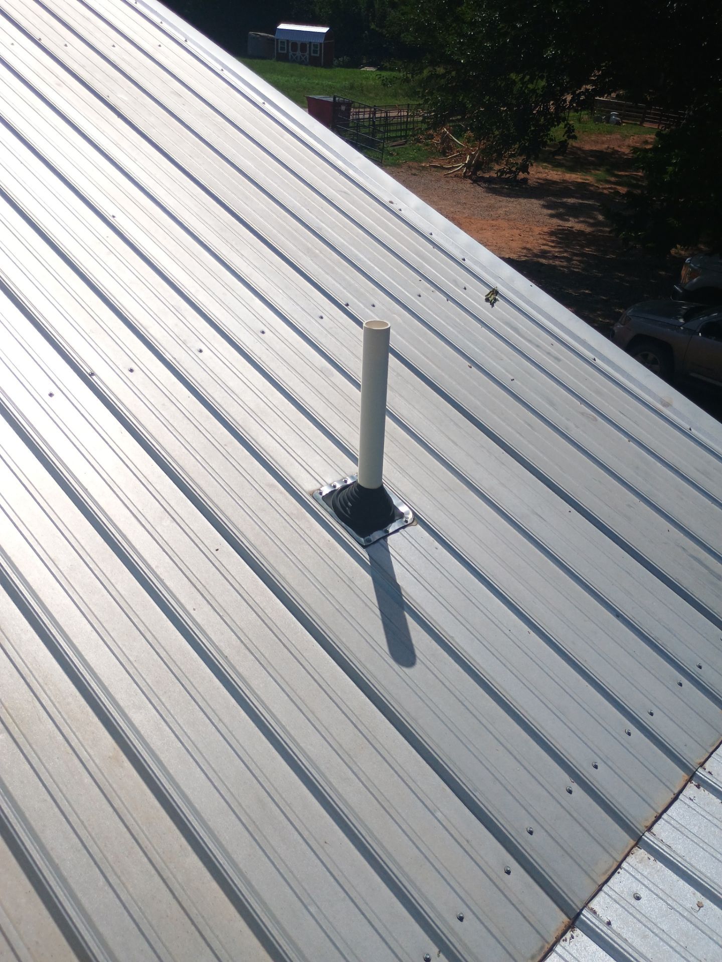 Corrugated Metal Roof Repair for Brick Home in Lindsay by BANA Roofing and Solar Supply