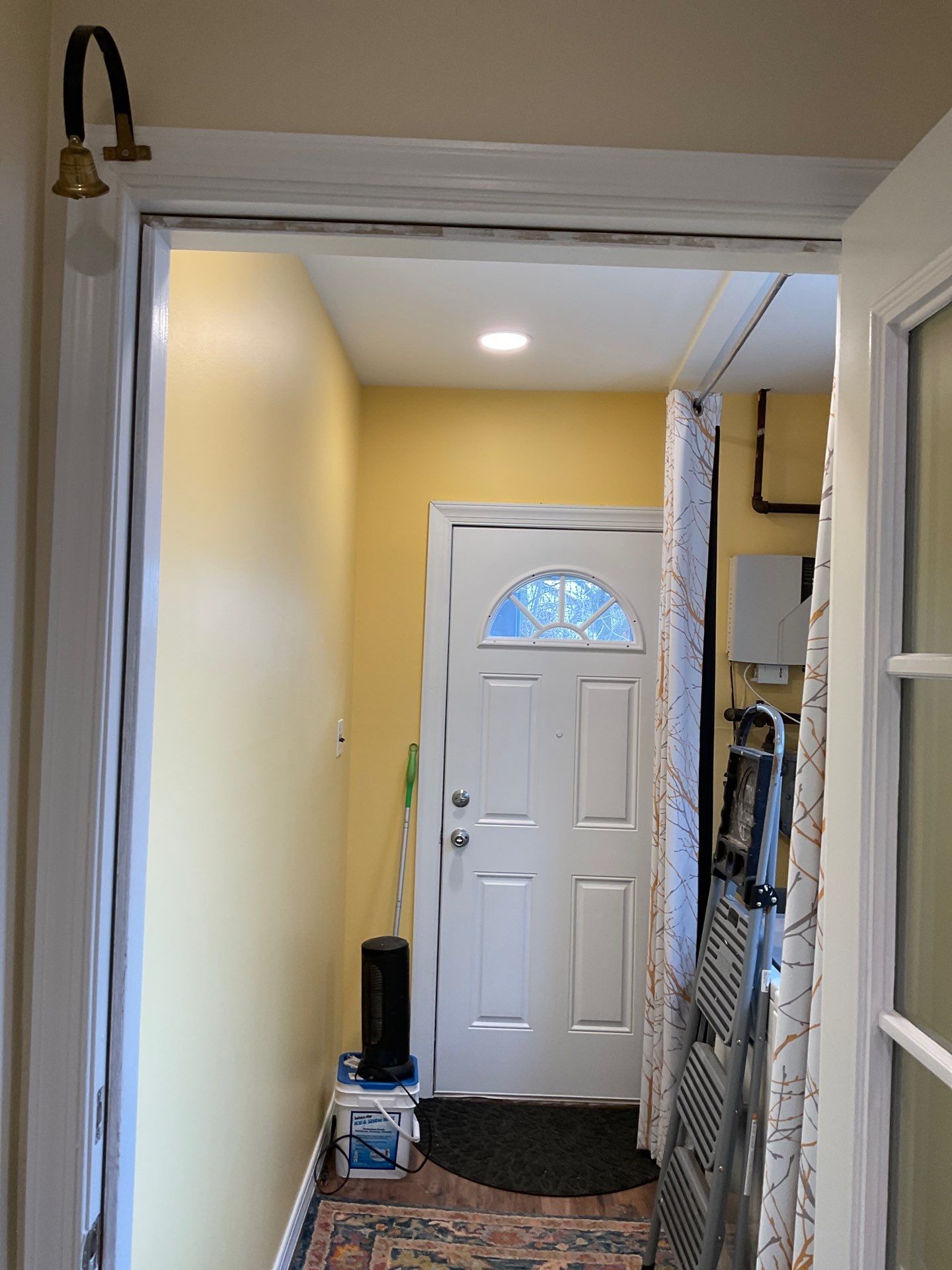 A Bright, Inviting Interior with Warm Yellow Accents by Groovy Hues