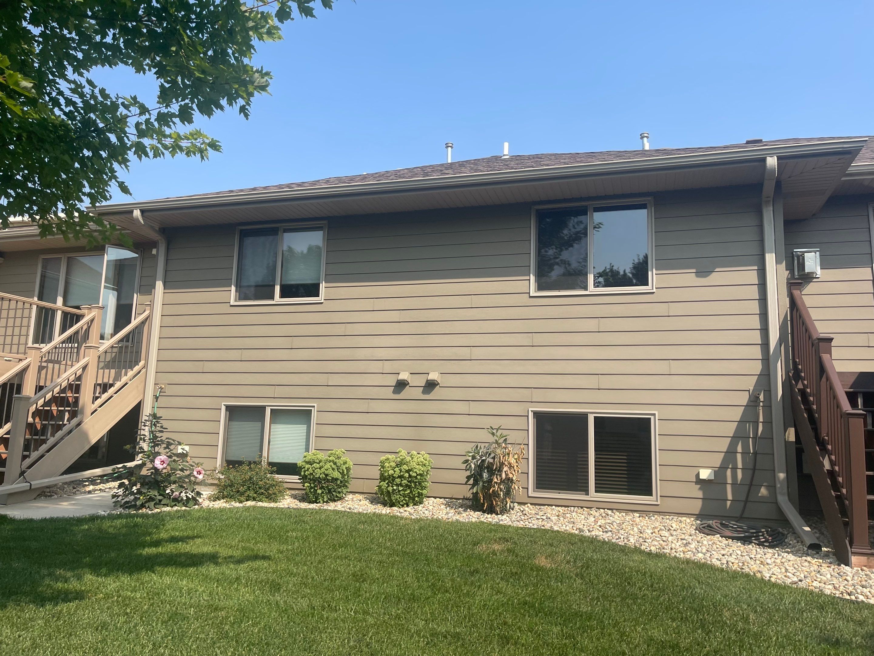 Residential Exterior Siding and Trim Painting in Sioux Falls by Select Painting, Coatings & Garage Cabinets