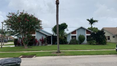 Residential Roofing Installation using 1" Nail strip metal roof