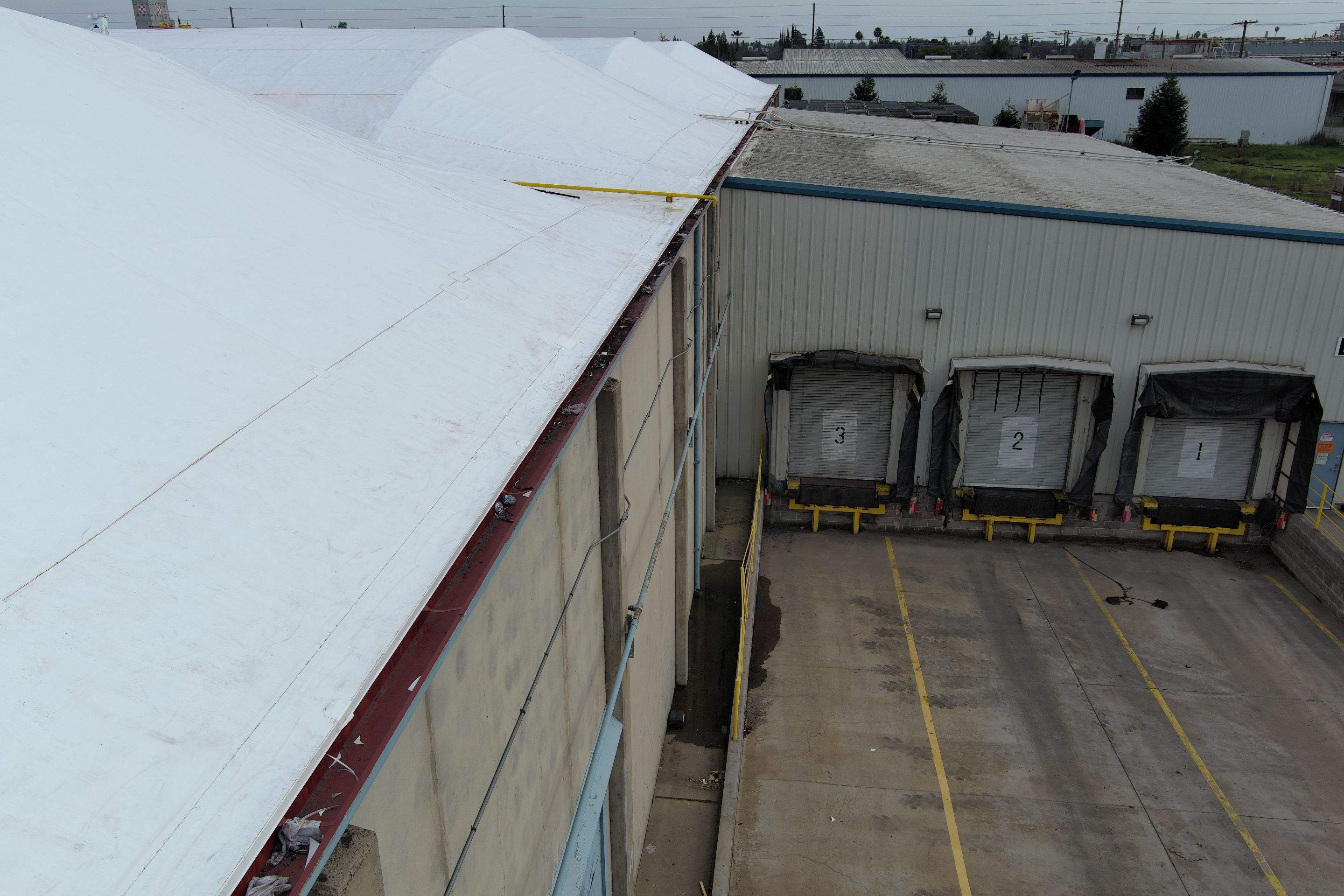 TPO single-ply roofing system using GAF Single-ply TPO 60 mil with 1.5 inch ISO board insulation by Straight Edge Roofing Inc