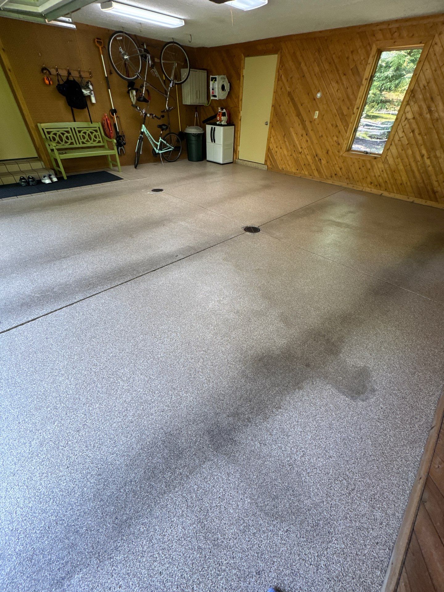 Grand Haven Garage Epoxy Floor Coating with Wax Wing Flake by Gordon Painting