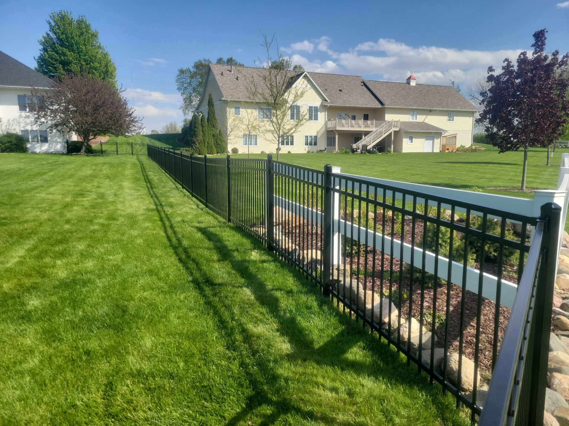 Black Ornamental Metal Picket Fence Installation in Waterloo by Perfect Picket Fence and Stain
