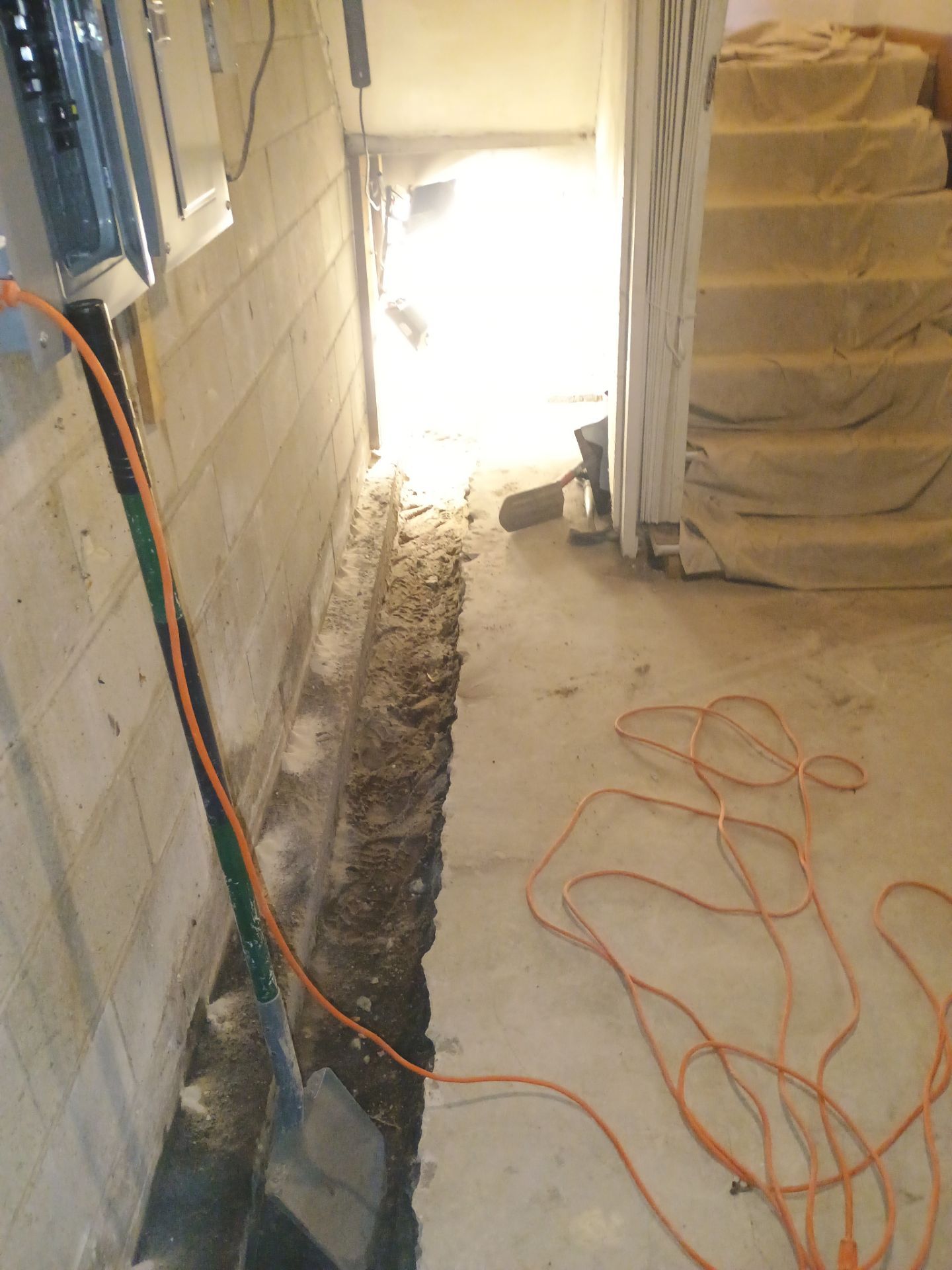 Interior Drain Tile & Buried Discharge in South Minneapolis by Waterproofing Northeast