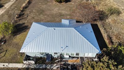 Residential Roof Replacement using 24 GA Standing Seam