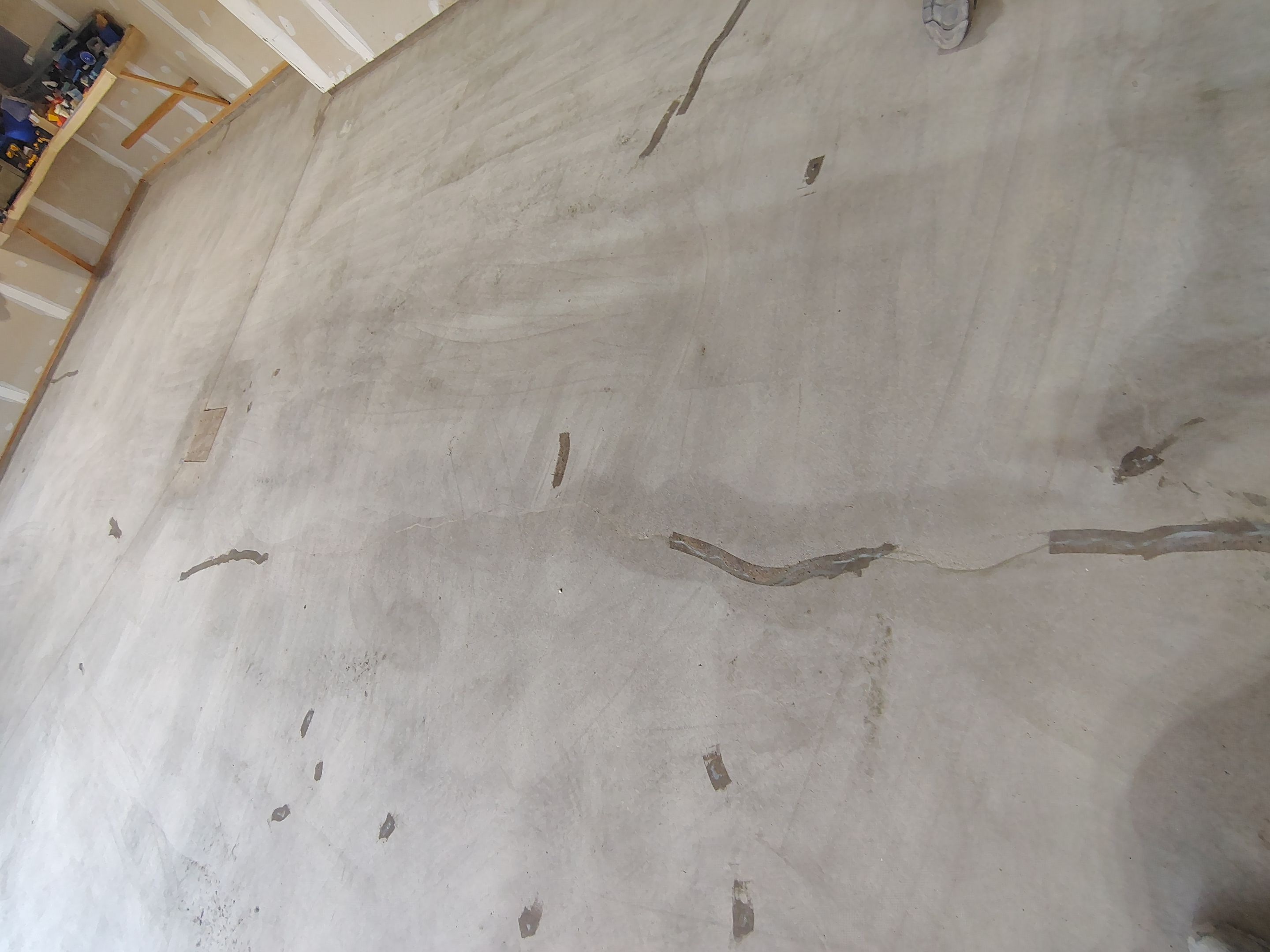 Sioux Falls Garage Concrete Grinding and Nightfall Decorative Chip Coating by Select Painting, Coatings & Garage Cabinets