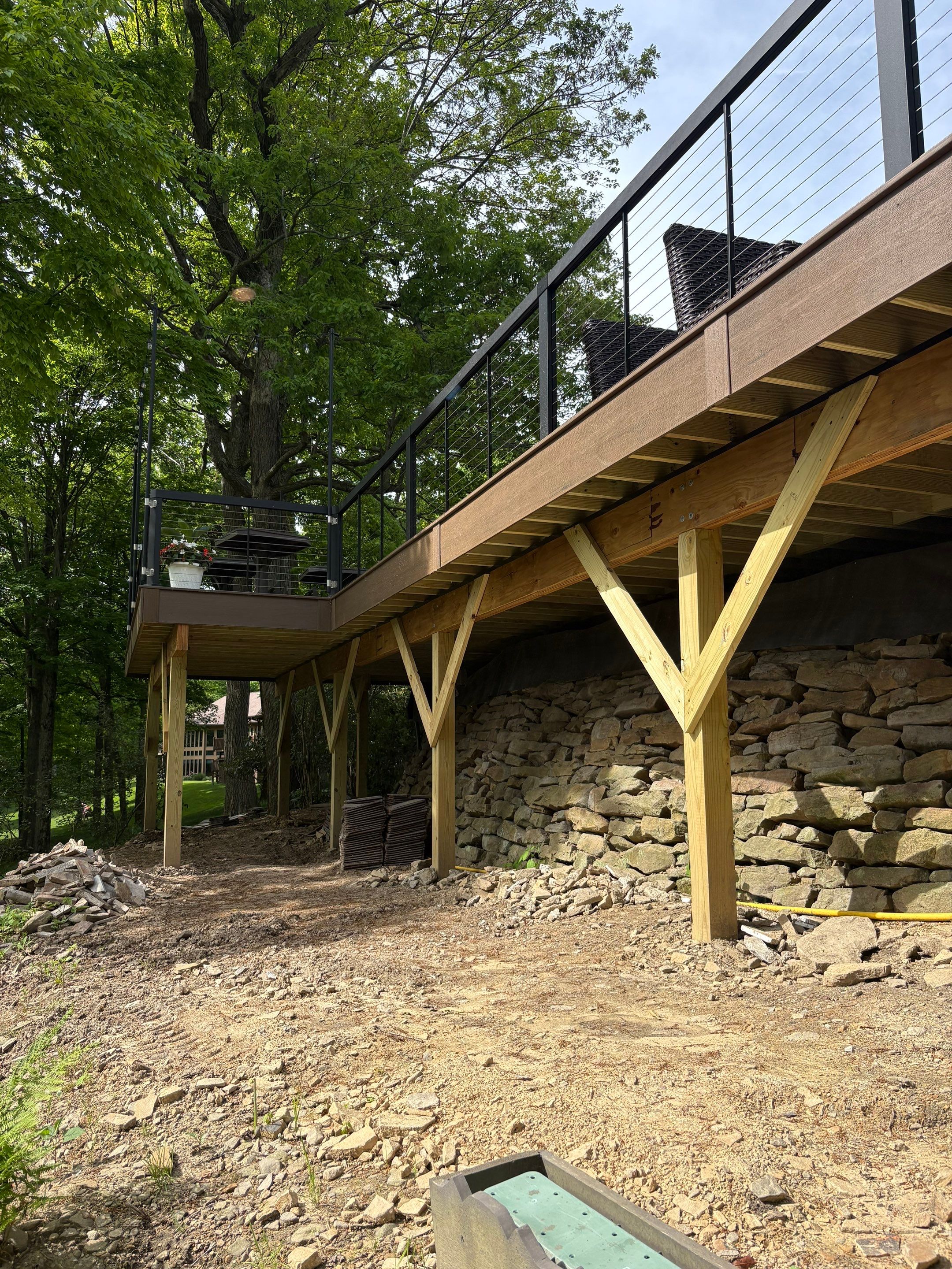 1500 sq/ft Composite Deck Build with Outdoor Kitchen in Champion by Cousins Roofing Siding & Decks