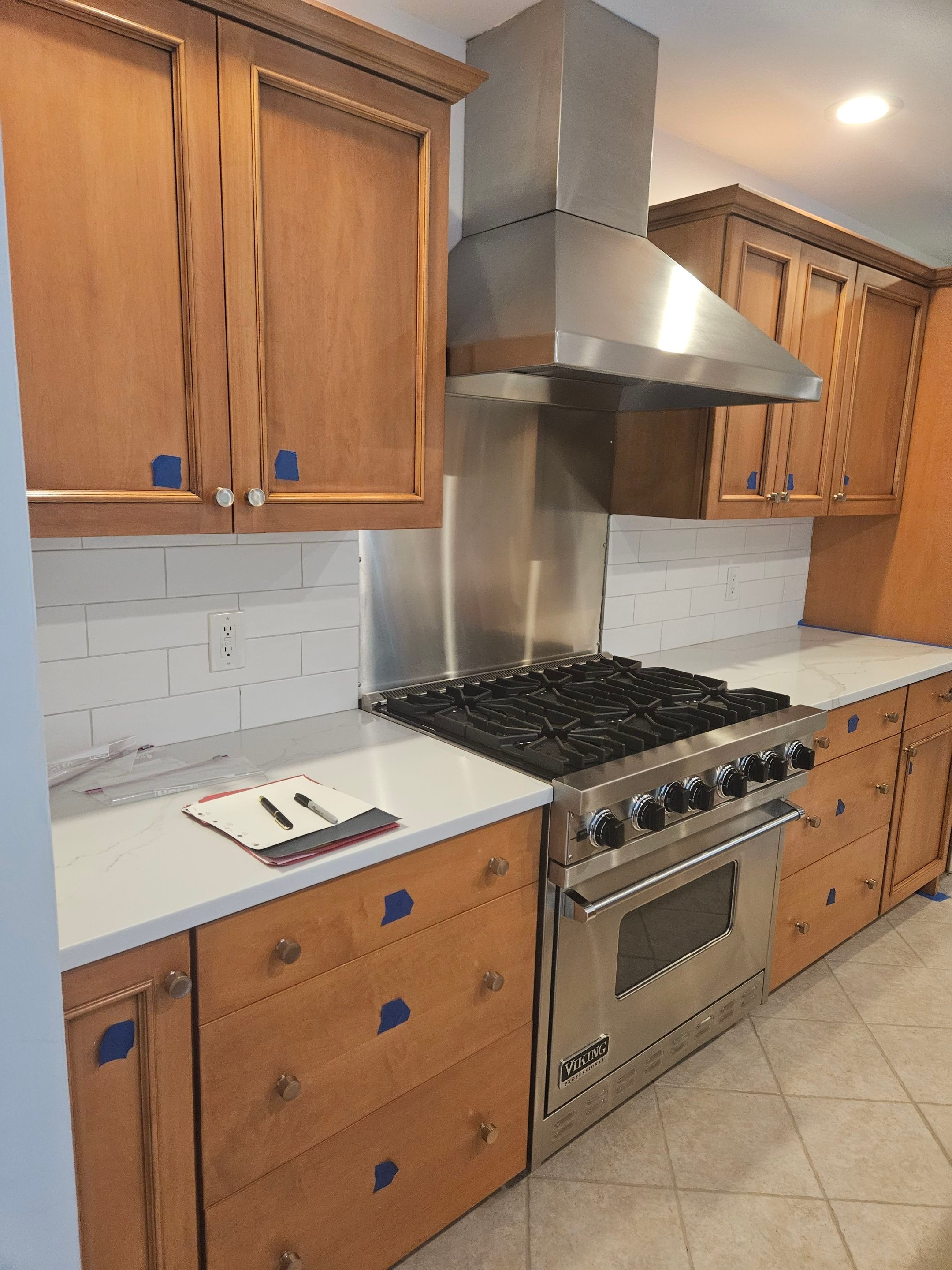 Chic Kitchen Cabinet Refinishing Project by Spectrum Painting, LLC
