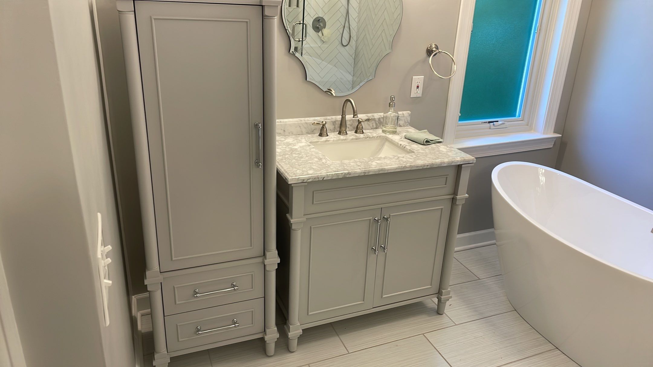 Bathroom Remodel using Schluter by Footprints Floors of Coastal Carolina