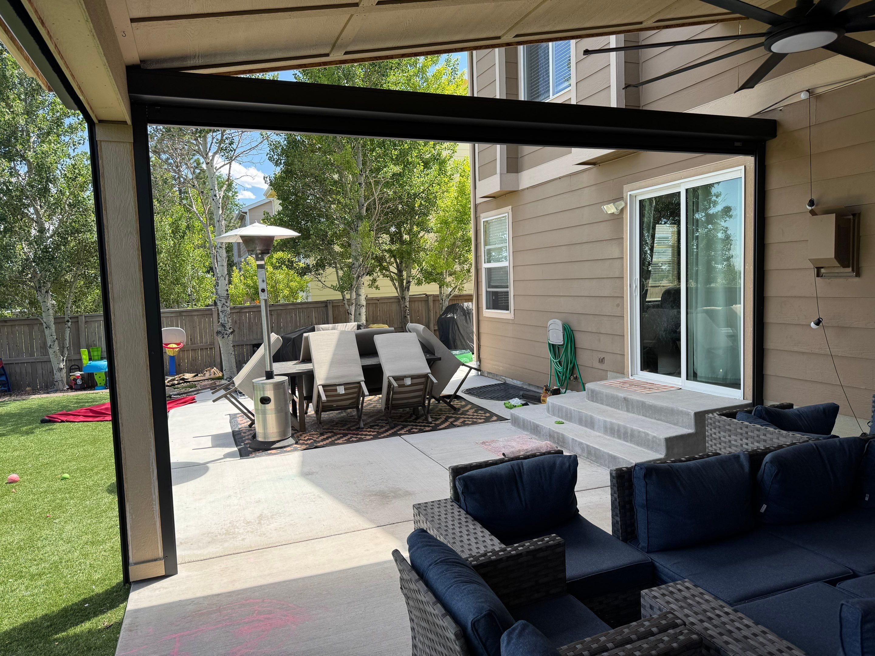 Motorized MagnaTrack Privacy Screen Installation on Castle Rock Patio by Outdoor Solutions Colorado
