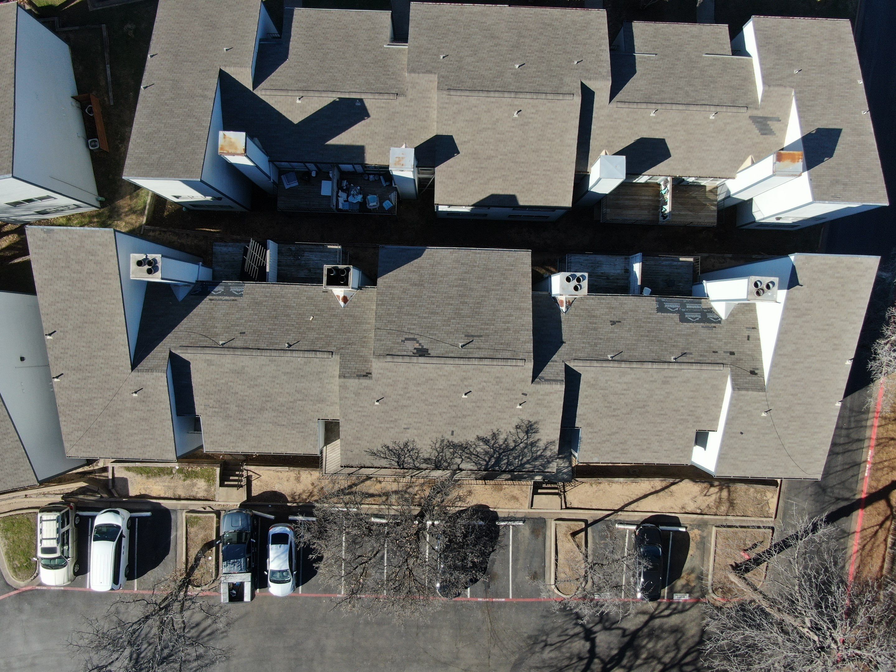 Apartment Roofing Repairs using Certainteed xt25 by Becker Roofing and Exteriors