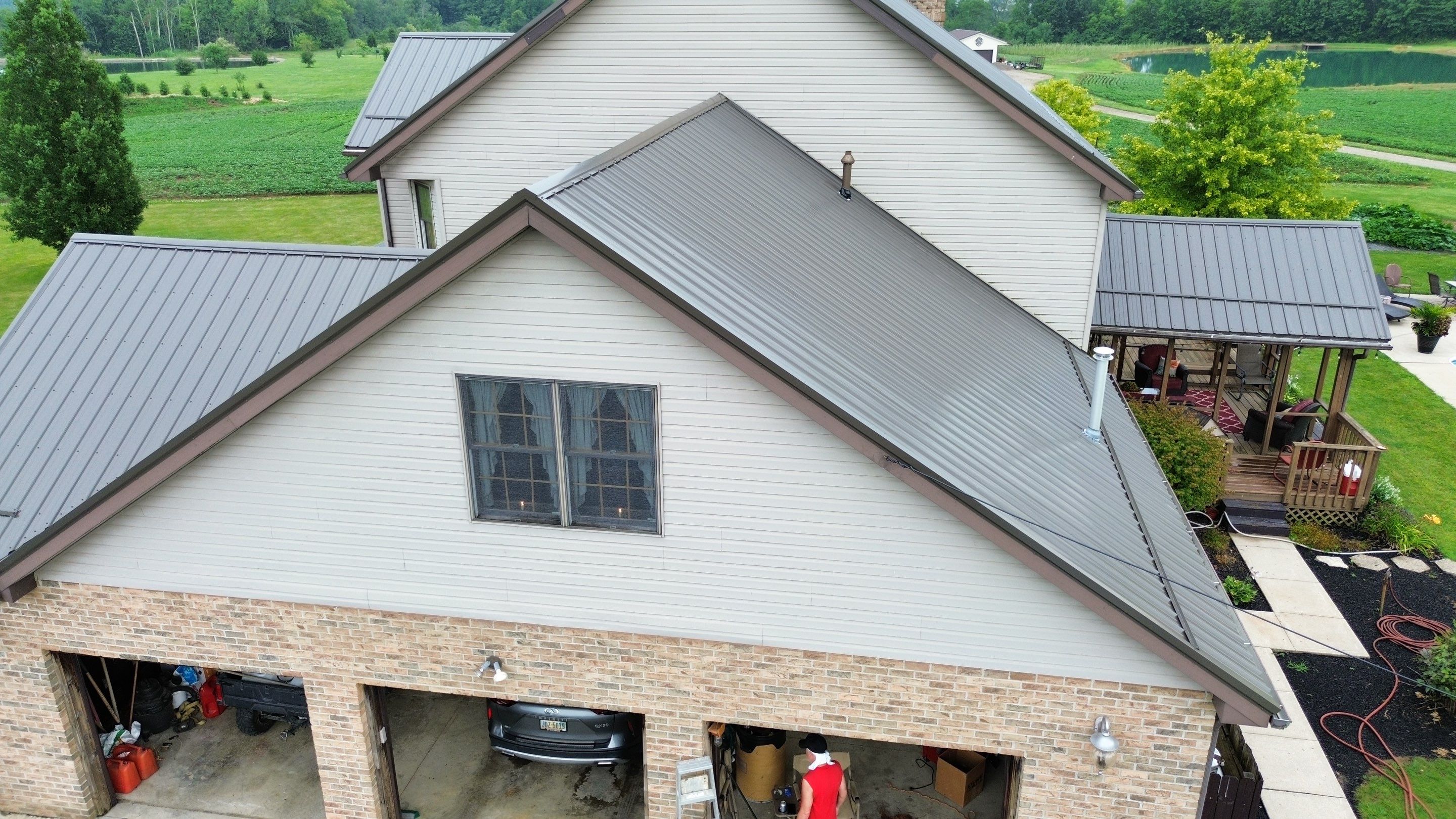 Residential Roofing Installation using Performance Panel Metal - Burnished Slate by RoofX 