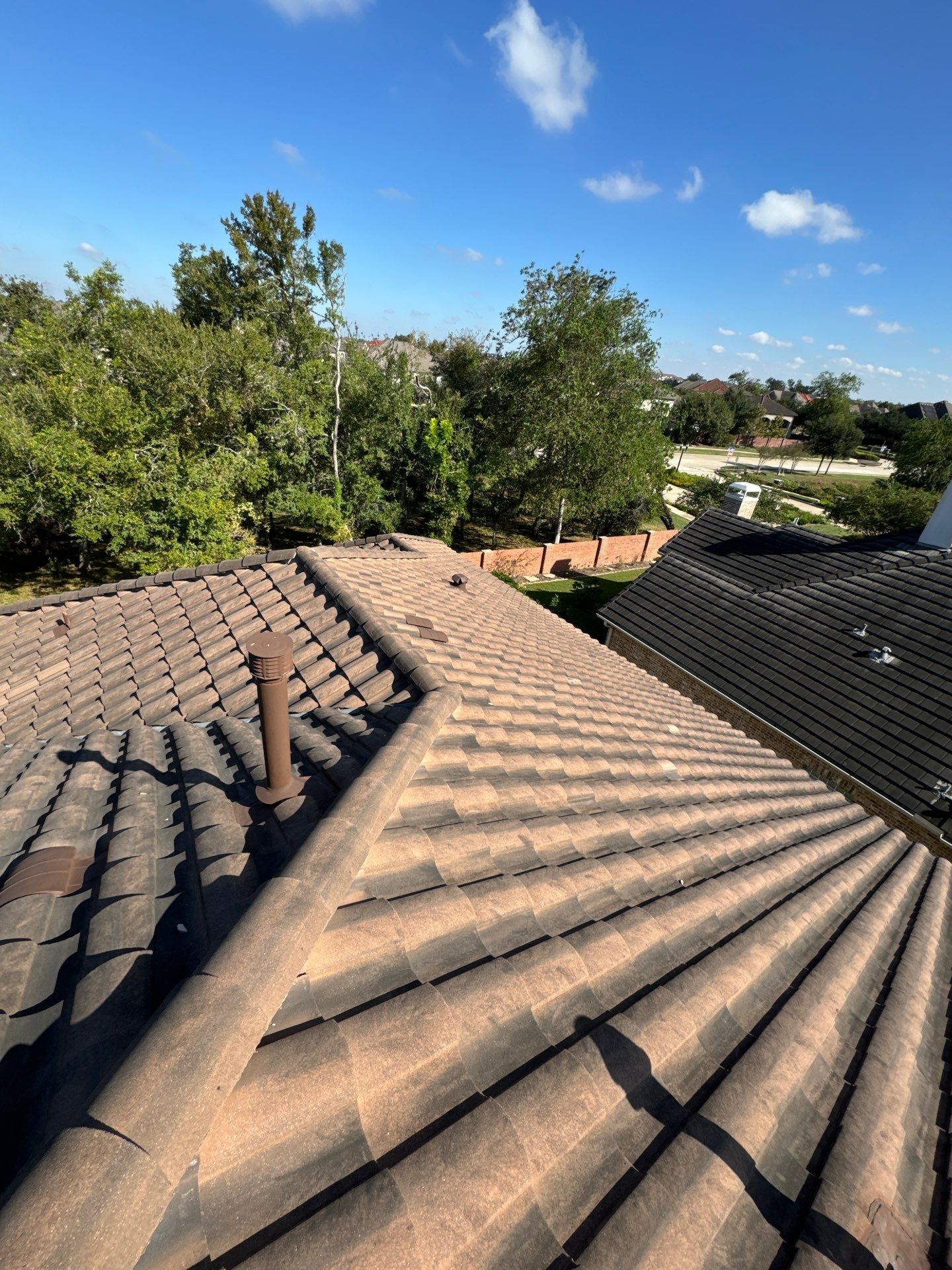 Tile Roof Maintenance  by Associates Roofing Unlimited 