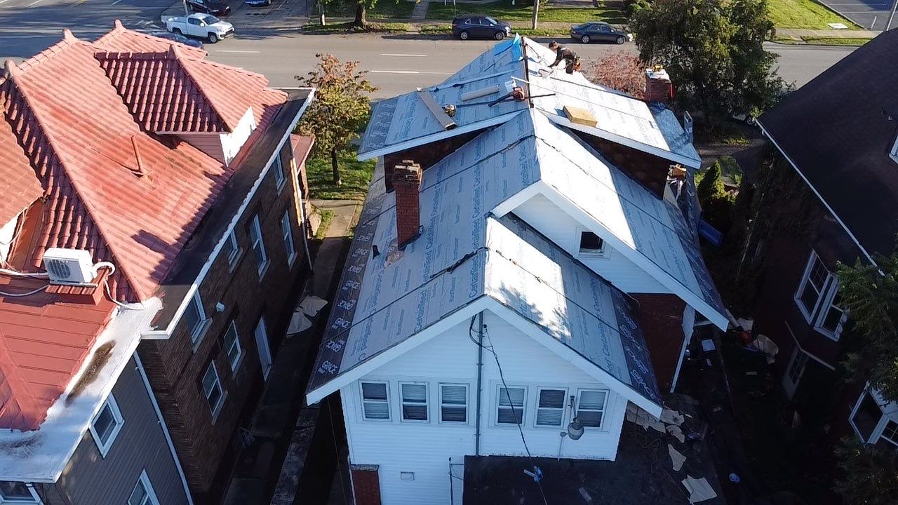 Adkins Project  by Fahey Roofing + Contracting